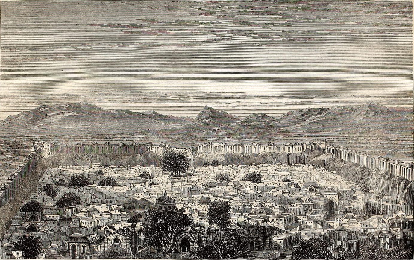 A 19th-century engraving looking down over the flat roofs and domes of a walled city, with a plain and mountains beyond