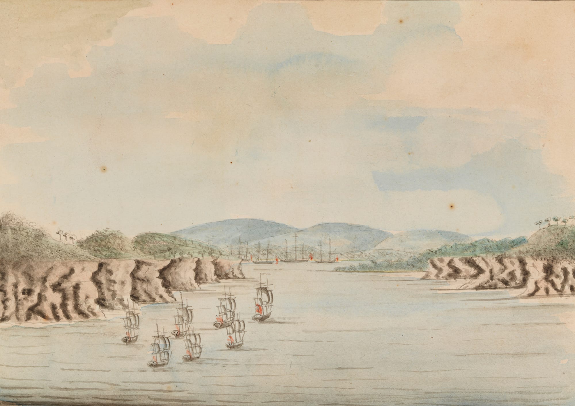 An 18th-century watercolour of tall ships anchored in a wooded cove with tents and figures on the shore