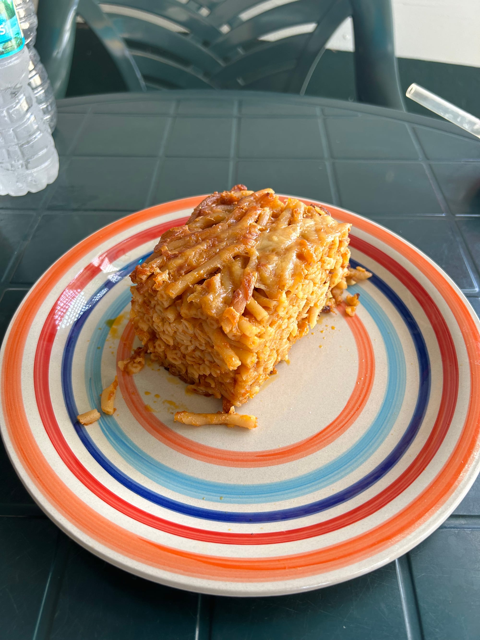 A baking dish of golden-topped, sliced macaroni pie