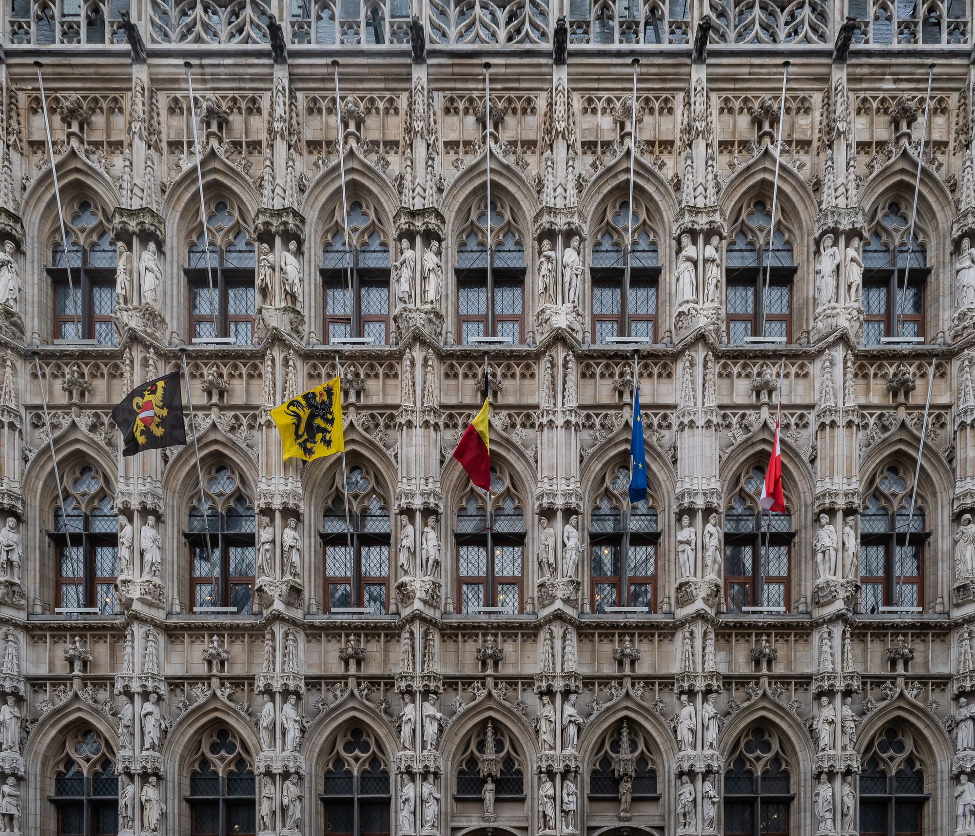 An extremely ornate Gothic town hall bristling with pinnacles, statues and turrets