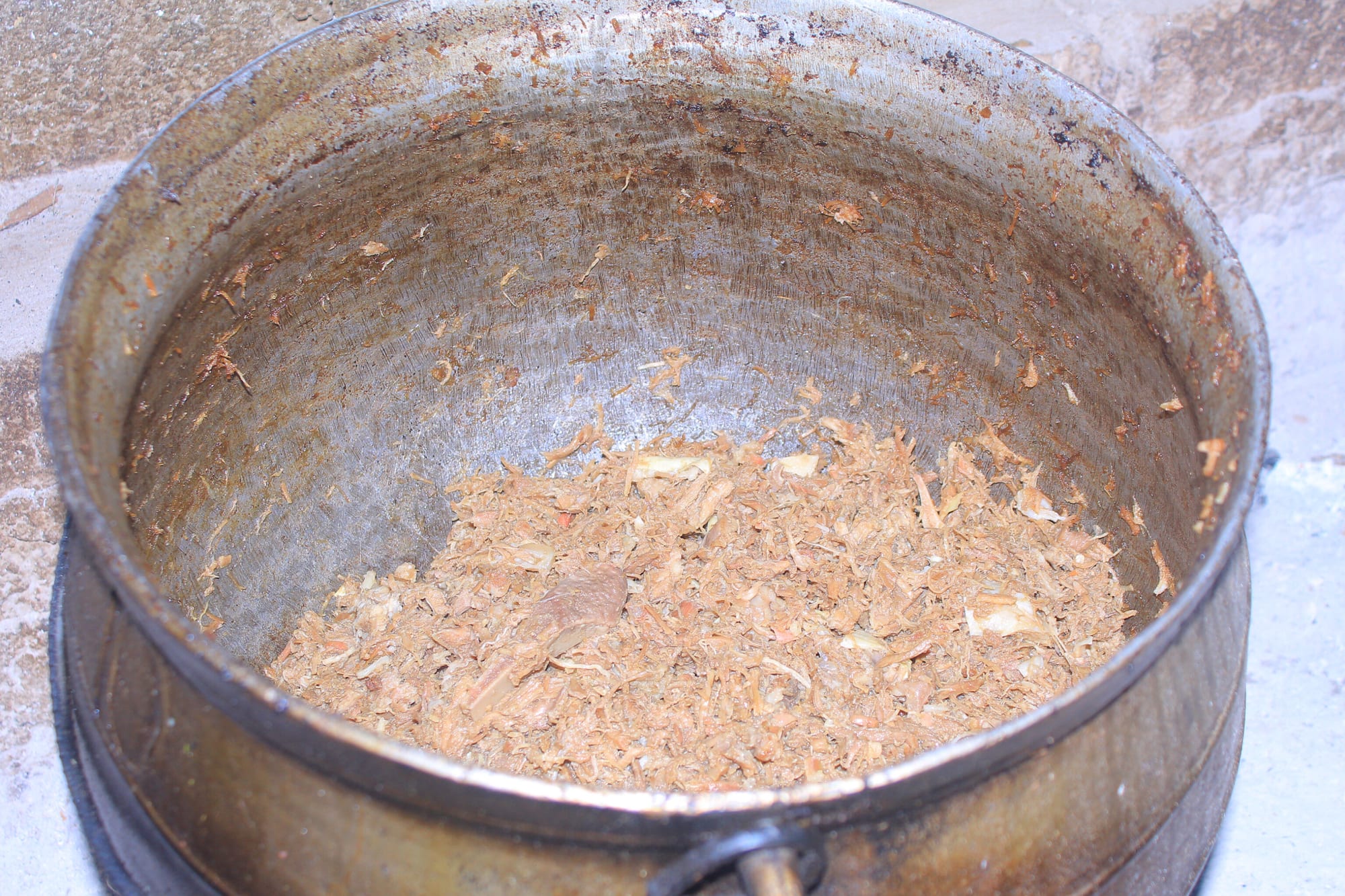 A large dish of shredded, pounded beef