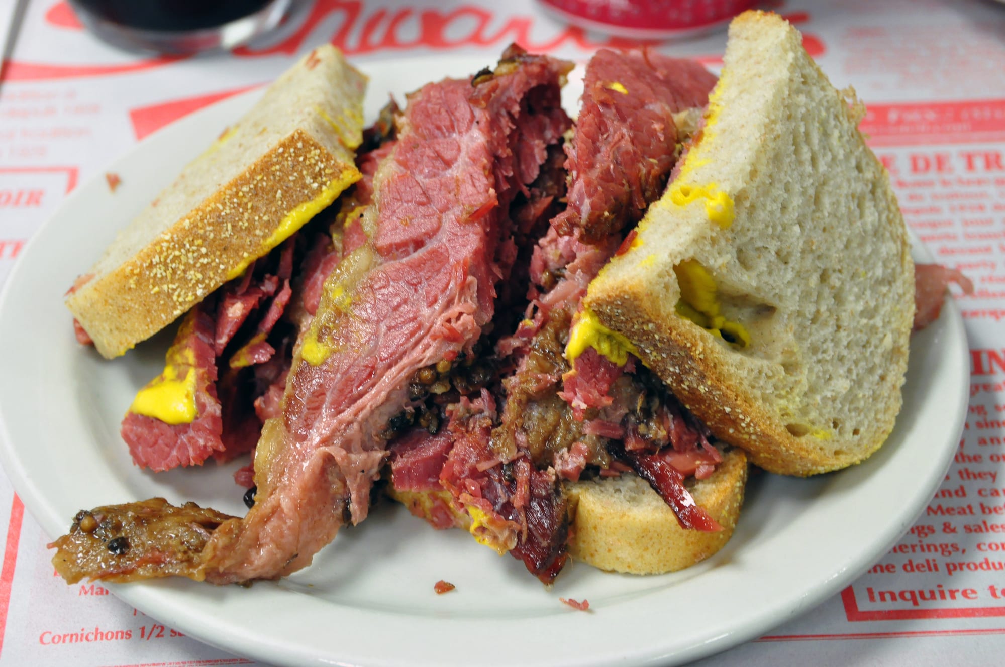 A thick sandwich piled high with sliced smoked meat