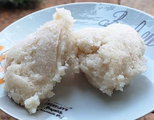 A ball of pale cassava paste, the country's everyday staple