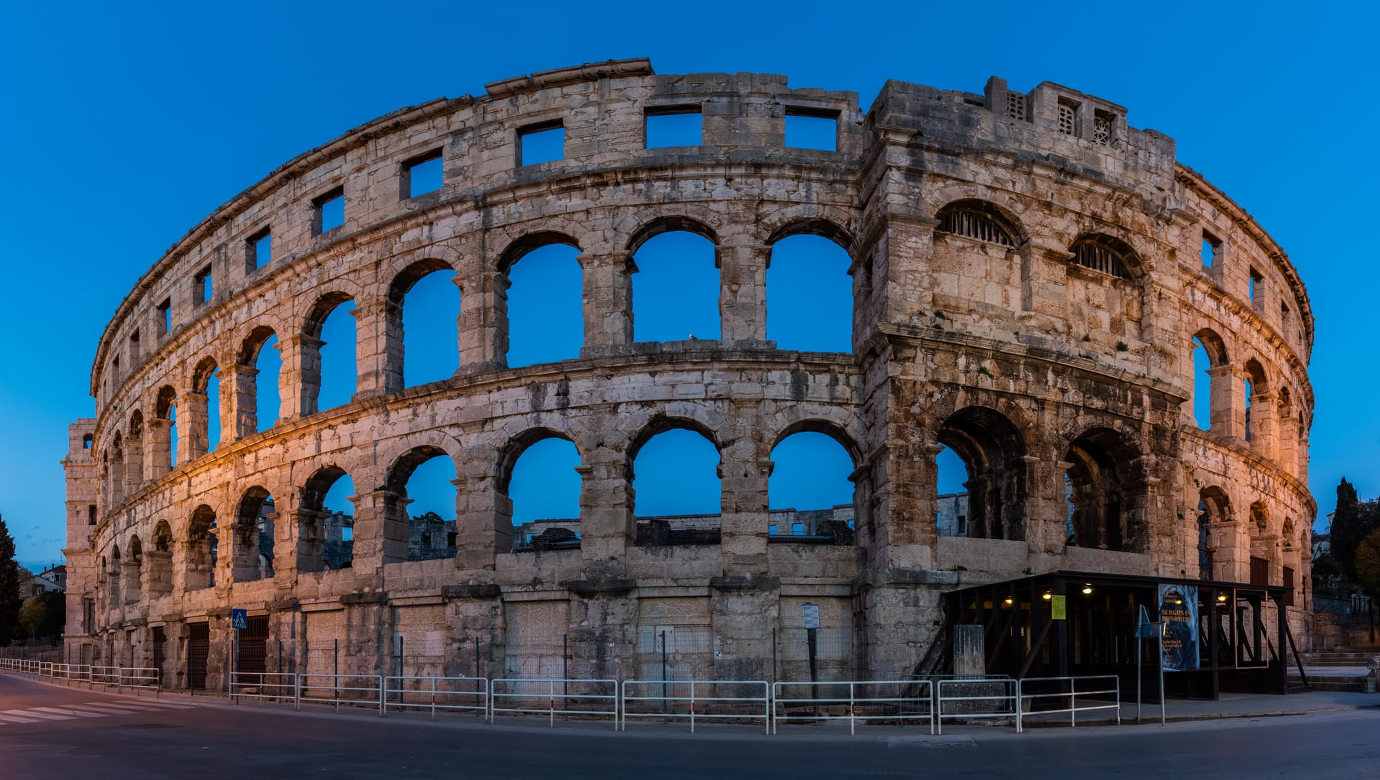 A large, well-preserved Roman amphitheatre with its full outer wall standing