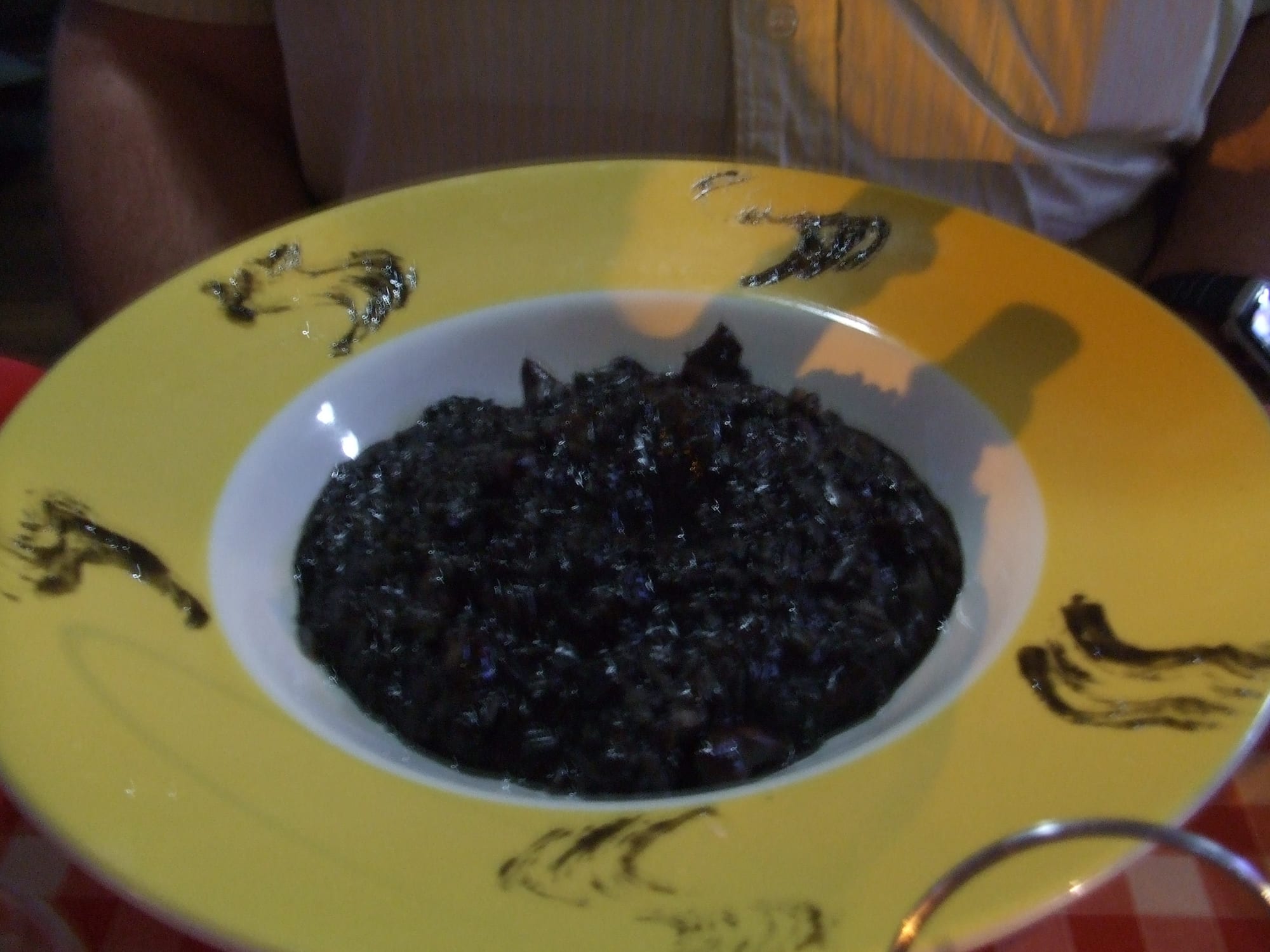 A plate of black risotto