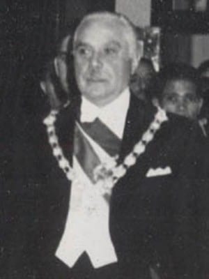 A formal 1952 photographic portrait of Rafael Trujillo in a heavily decorated military uniform