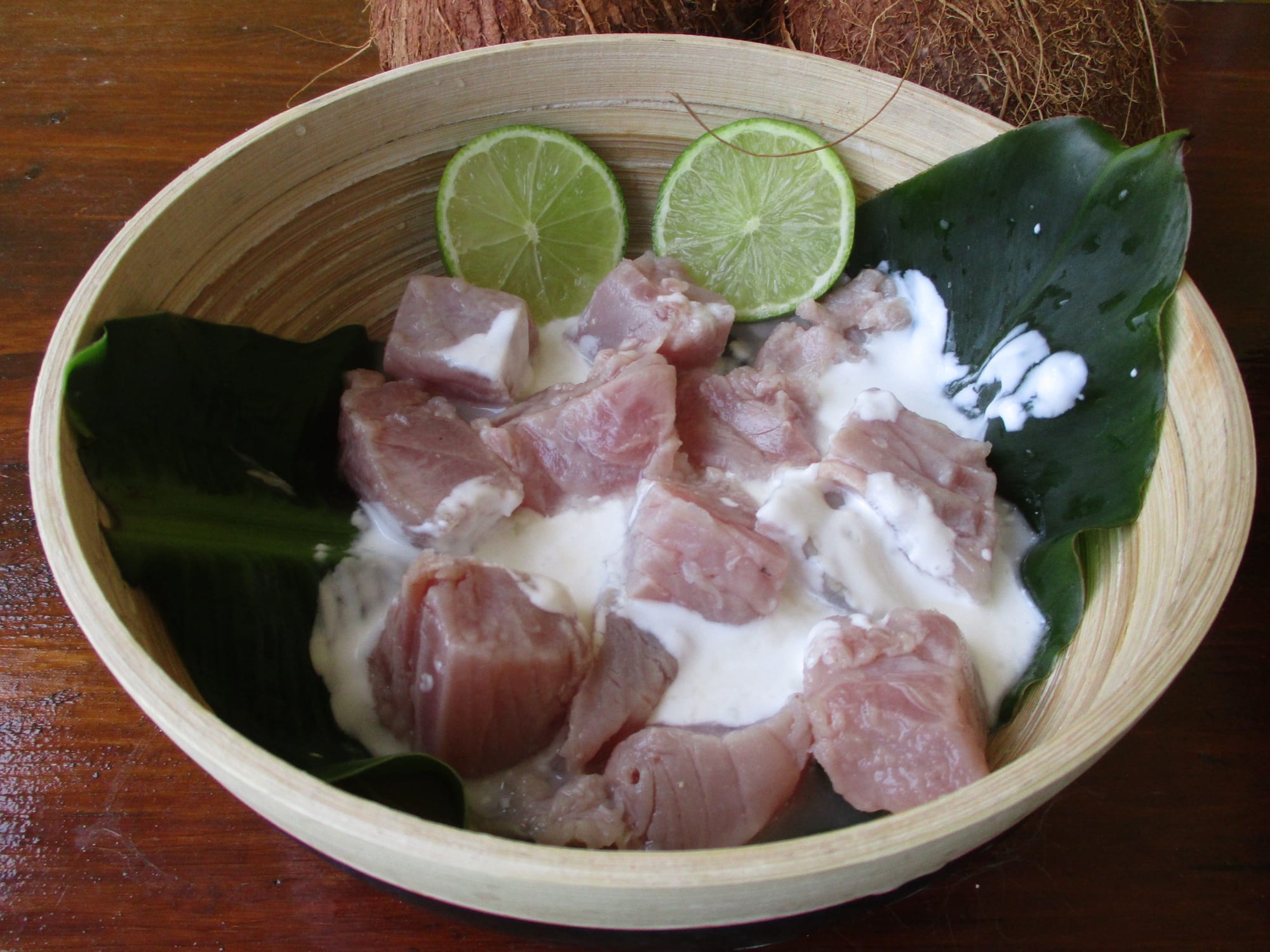 Diced raw fish mixed with vegetables in a coconut-milk sauce