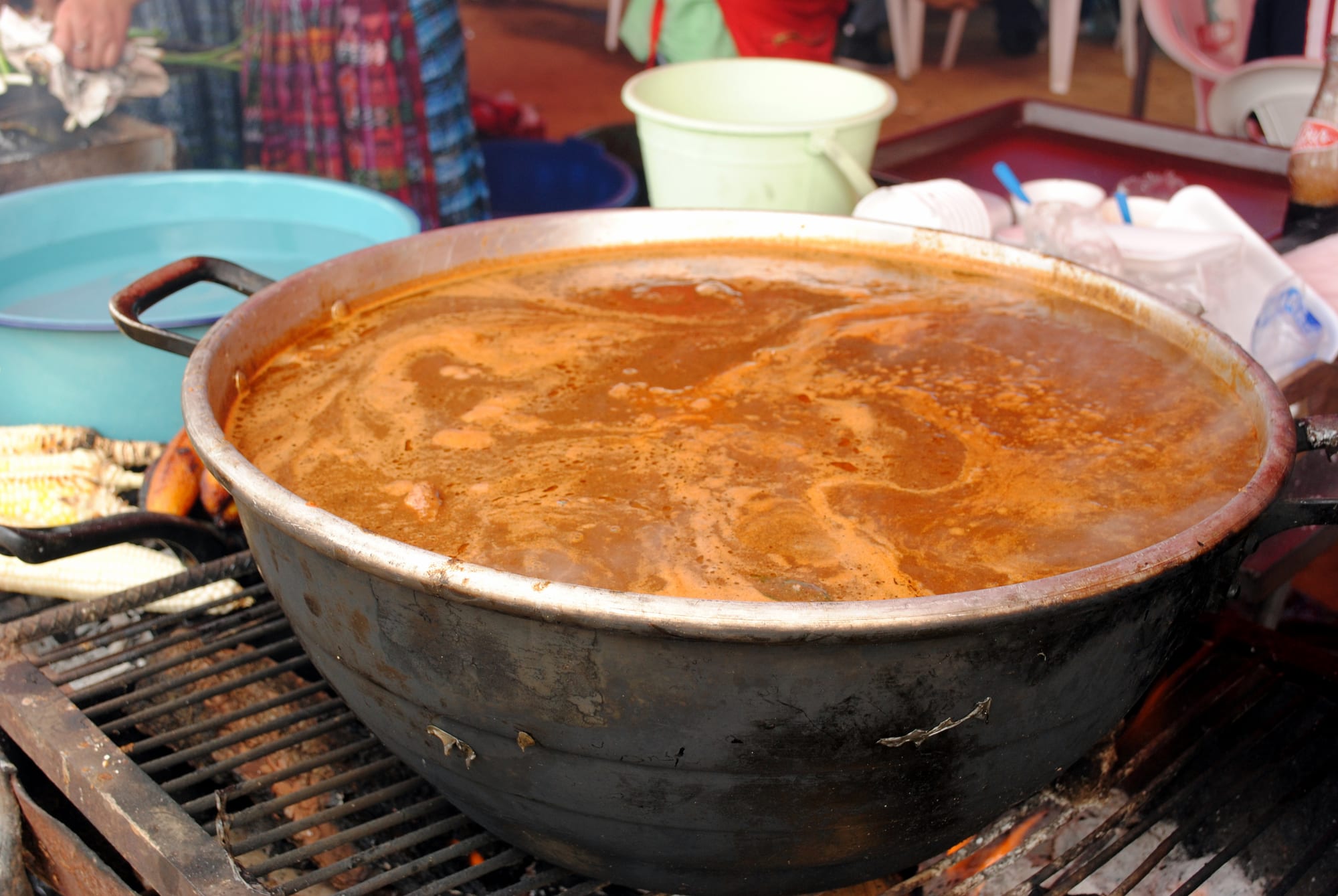 A large pot of thick, reddish-brown stew