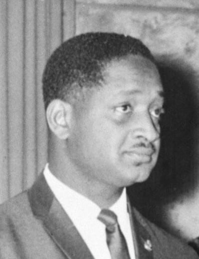 A portrait of Forbes Burnham in a suit, 1966