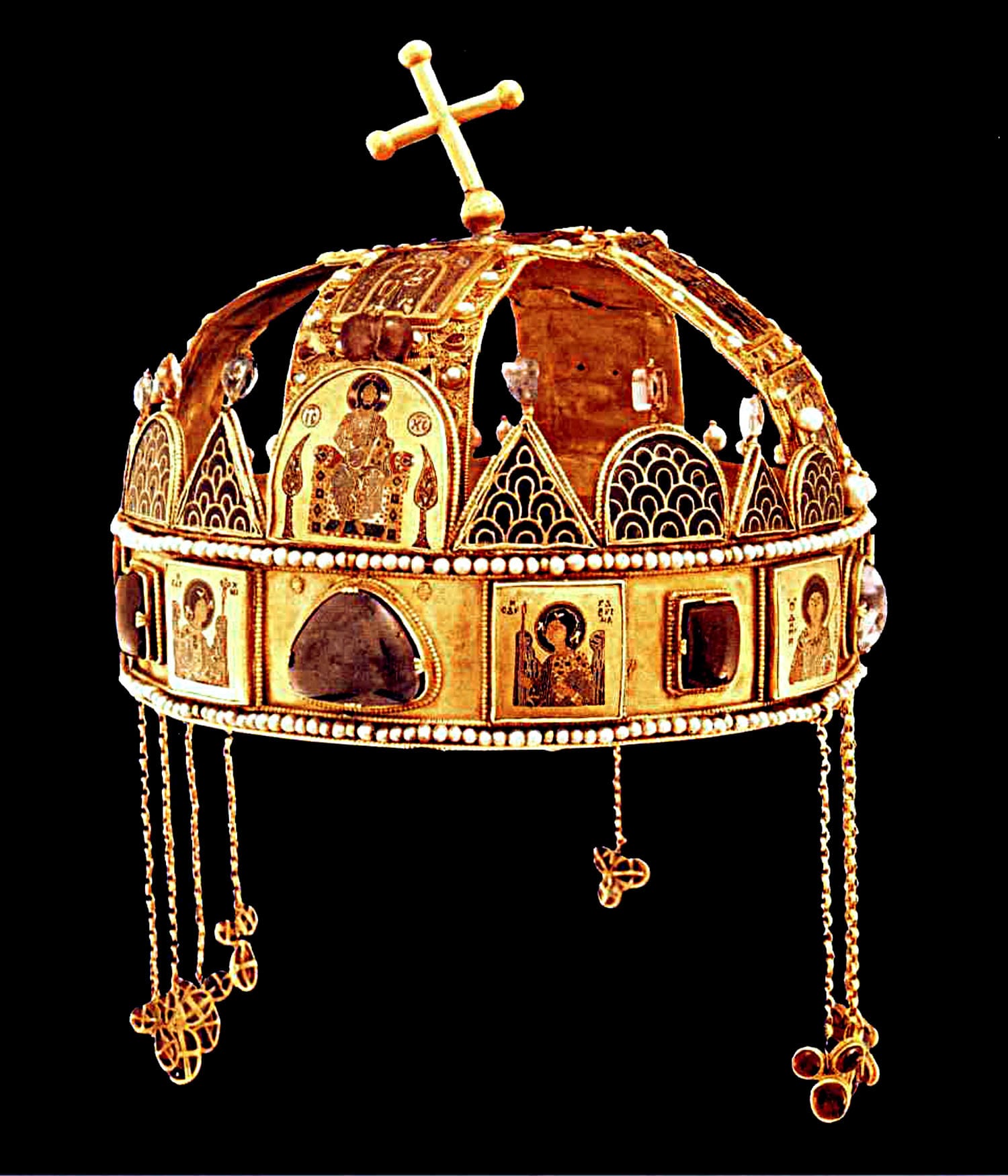 The jewelled gold Holy Crown of Hungary with a bent cross on top and enamel plaques