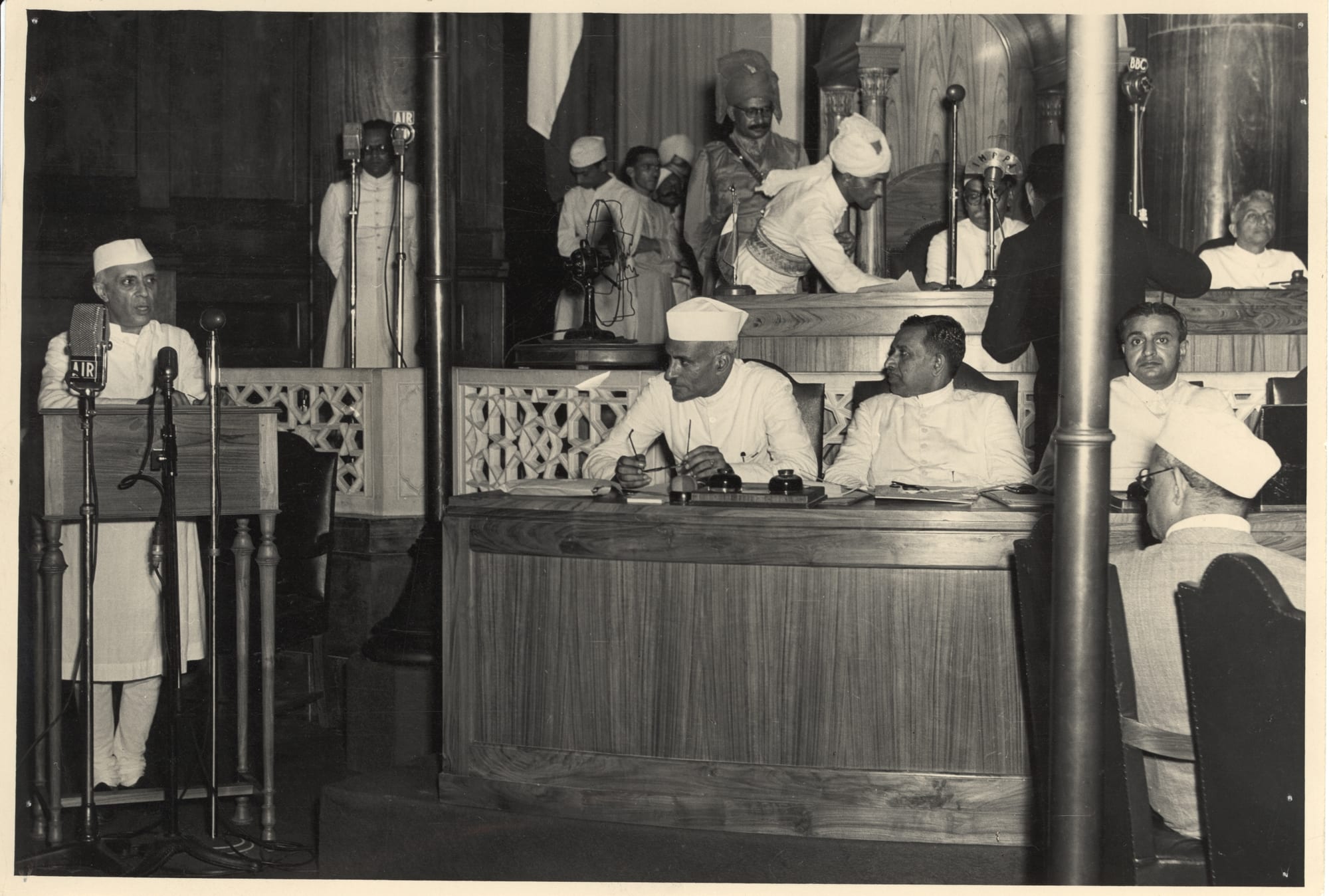 Jawaharlal Nehru speaking at a microphone in 1947
