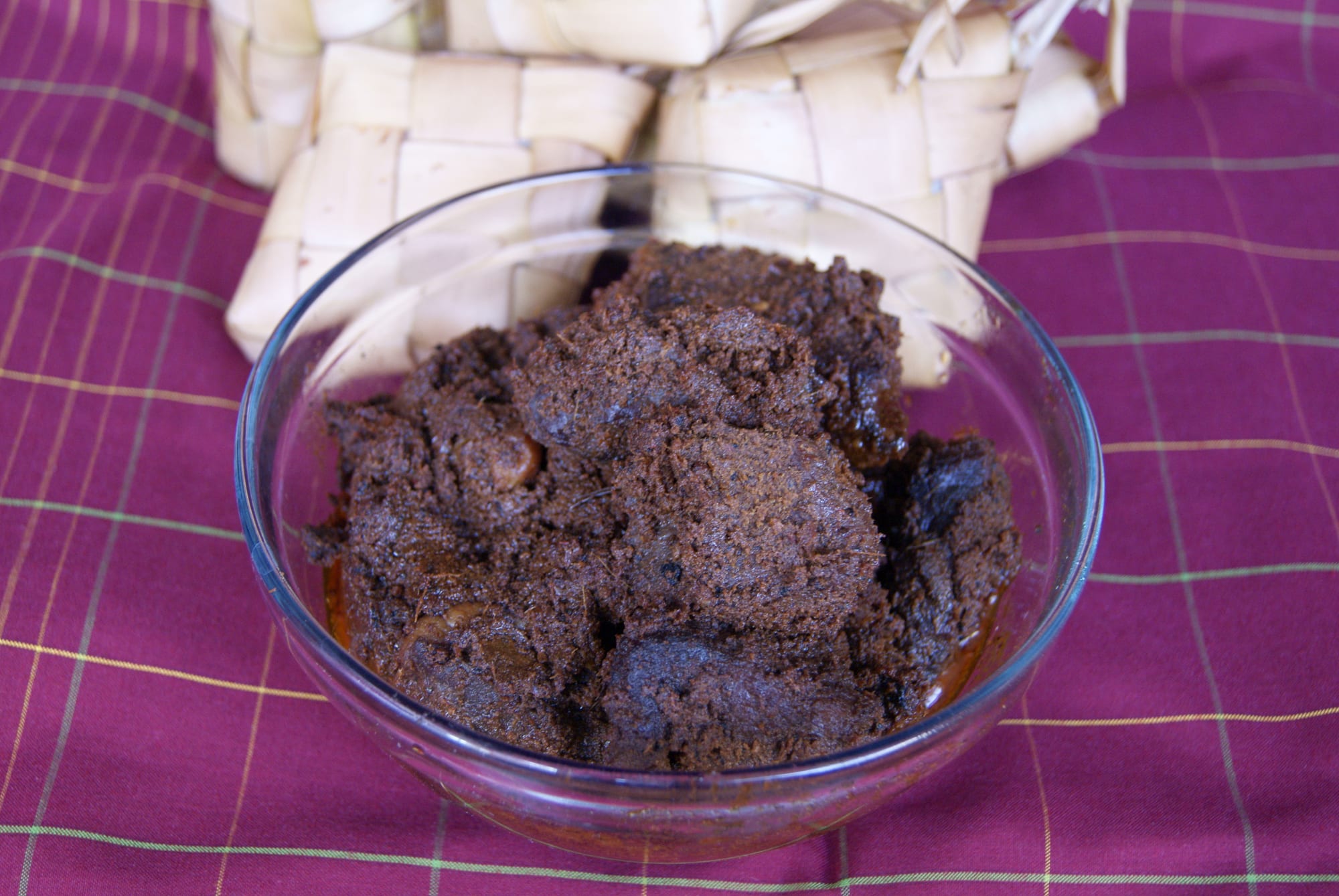 Dark, thick pieces of beef in a rich sauce served with rice cakes