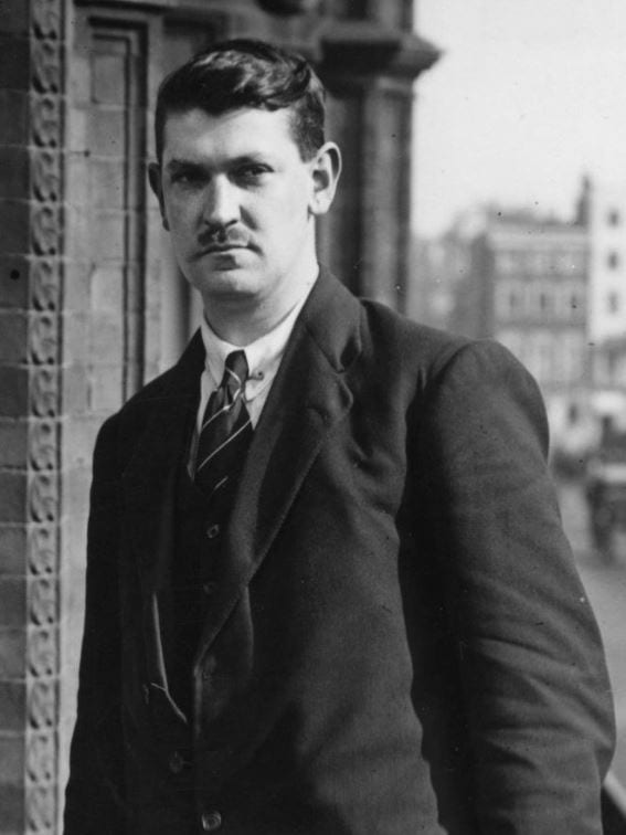 A portrait of Michael Collins in a suit, around 1921