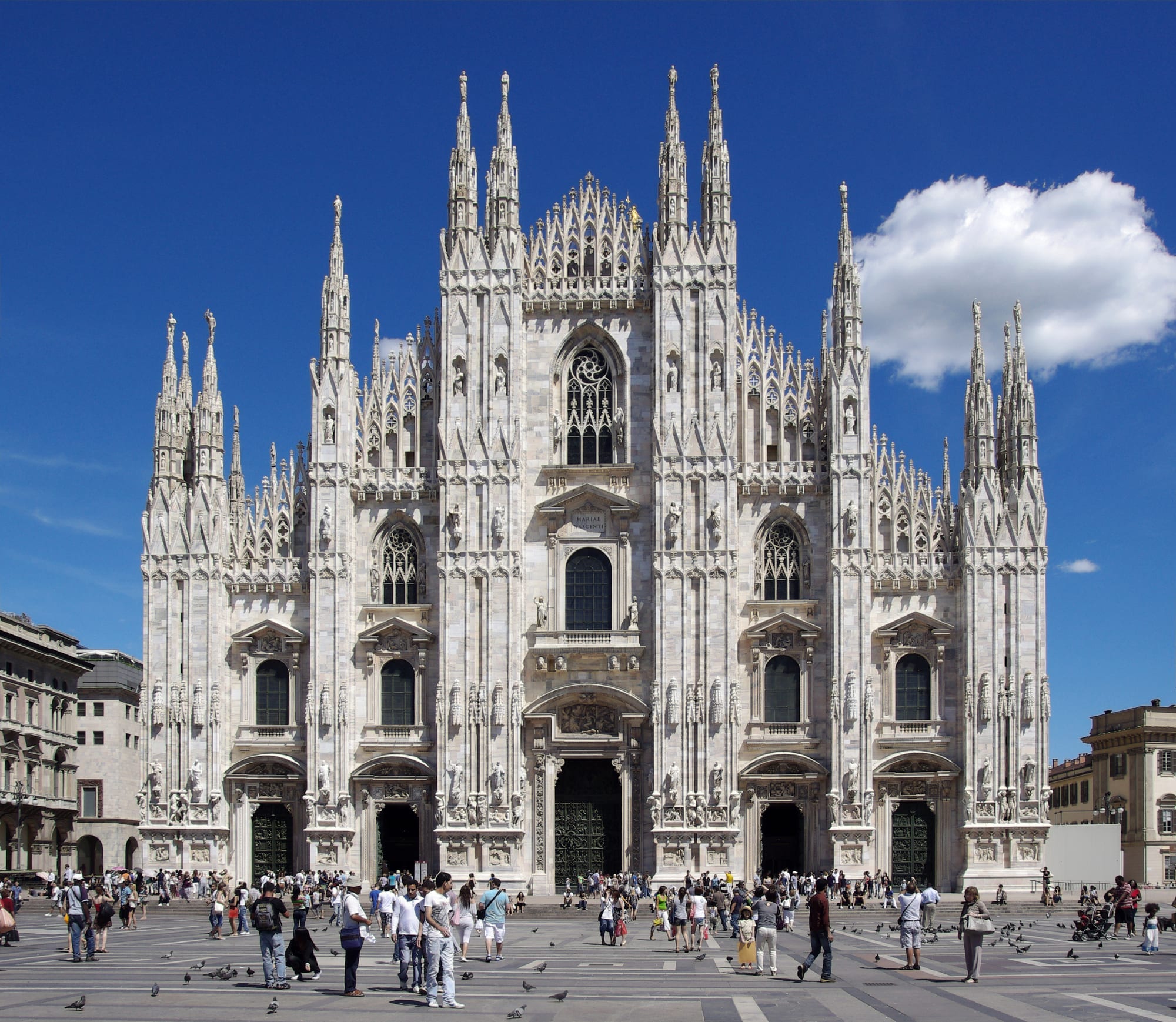 A vast white marble Gothic cathedral bristling with hundreds of spires and statues