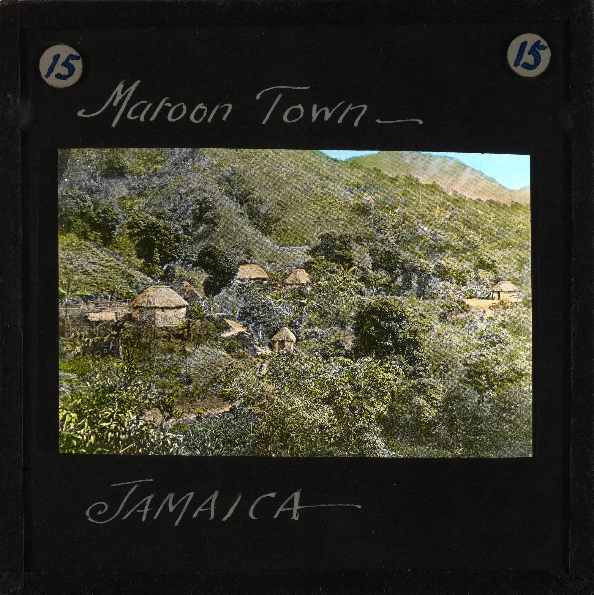 An early 20th-century photograph of thatched and wooden houses in the Maroon town of Accompong