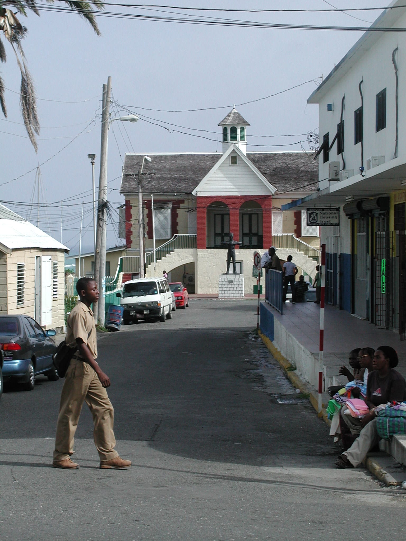 A statue of Paul Bogle in front of the restored Morant Bay courthouse