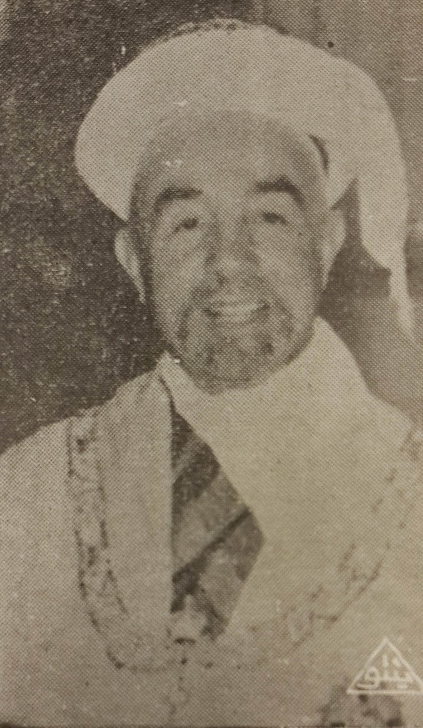 A formal portrait of King Abdullah I of Jordan in robes and headdress