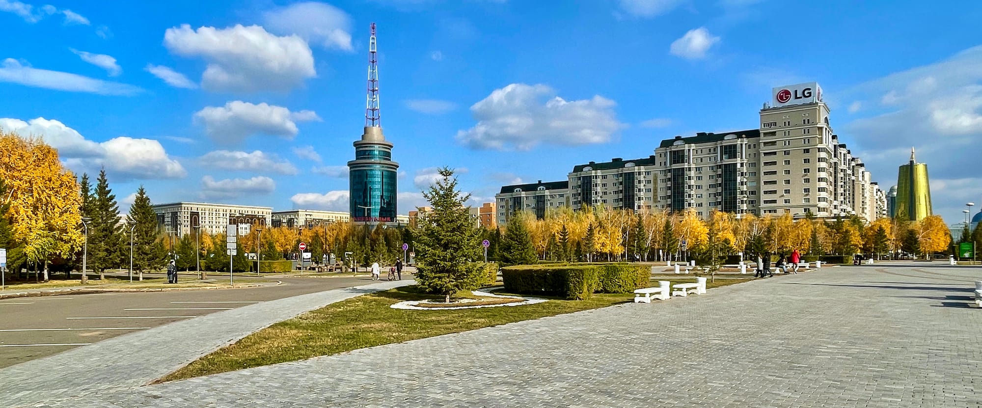 A skyline of futuristic glass towers and monuments in the planned capital of Astana