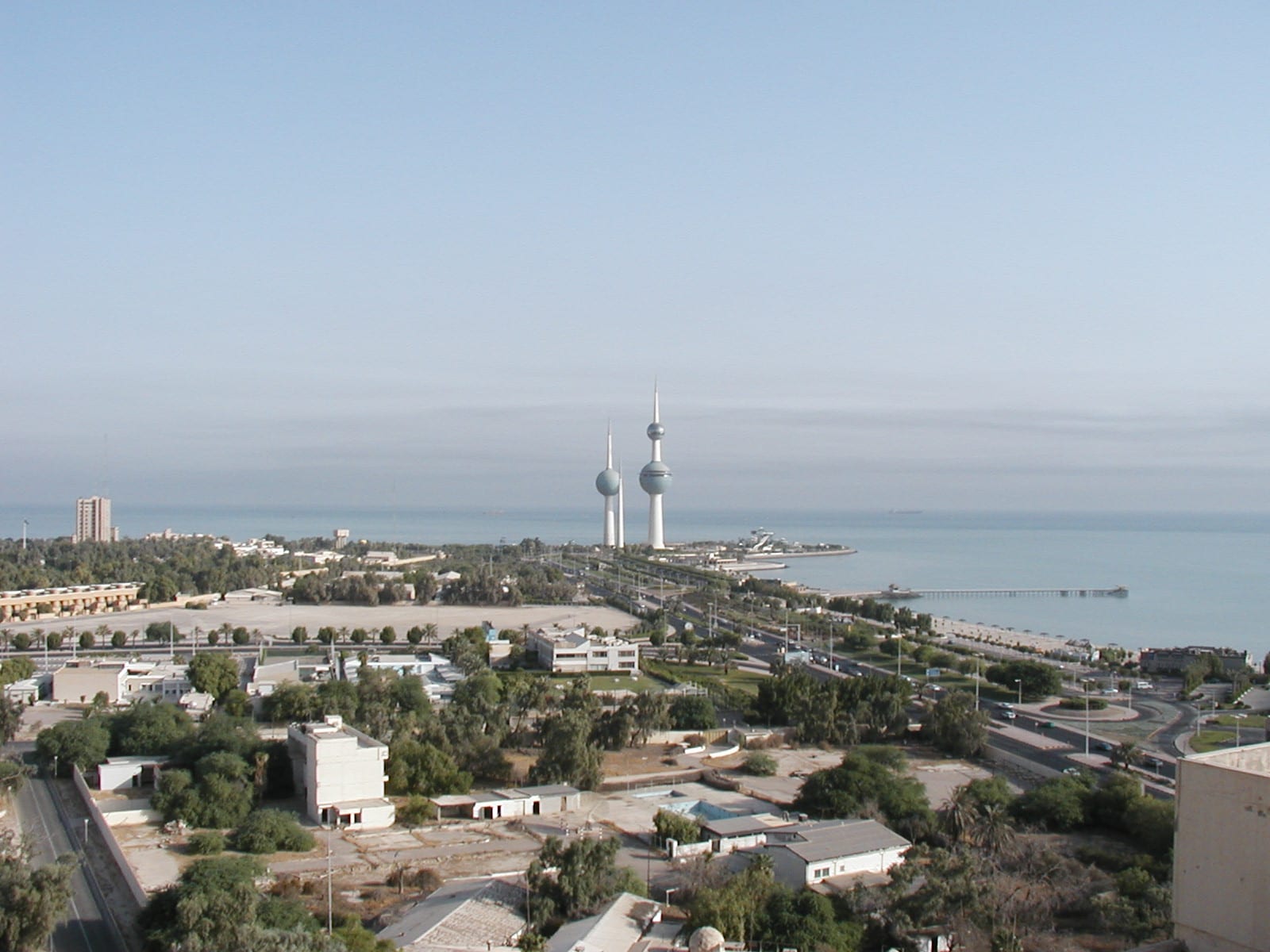 The Kuwait Towers viewed from below, showing the largest blue sphere near the top