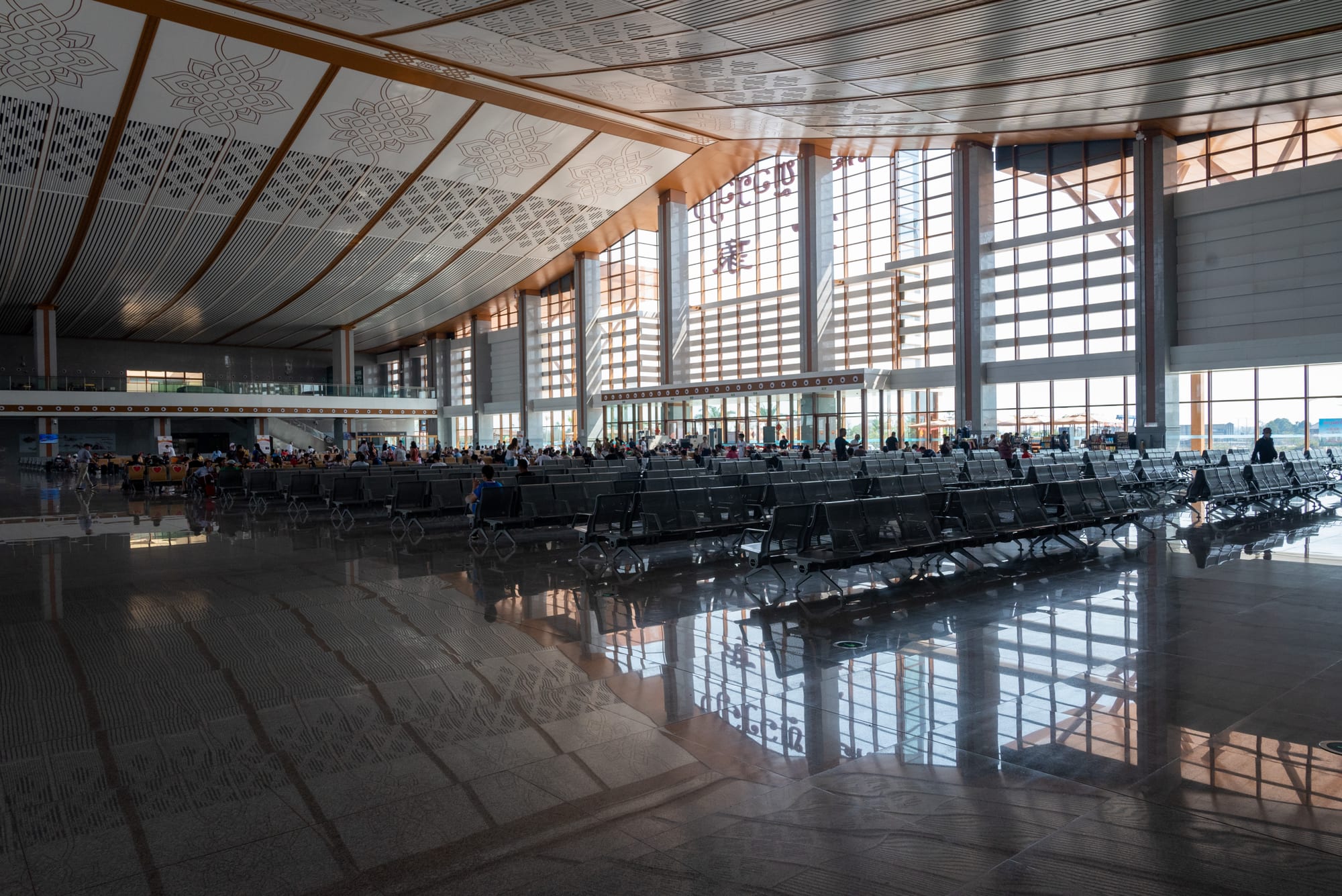 A large modern railway station with a sweeping roof in Vientiane, built for the China–Laos line