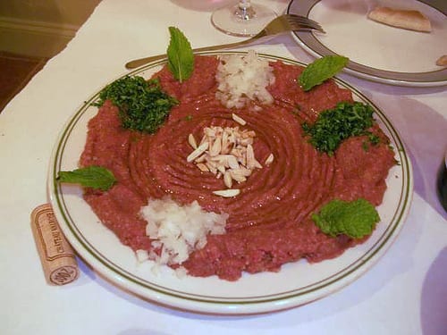 A mound of finely worked raw meat and bulgur mixture