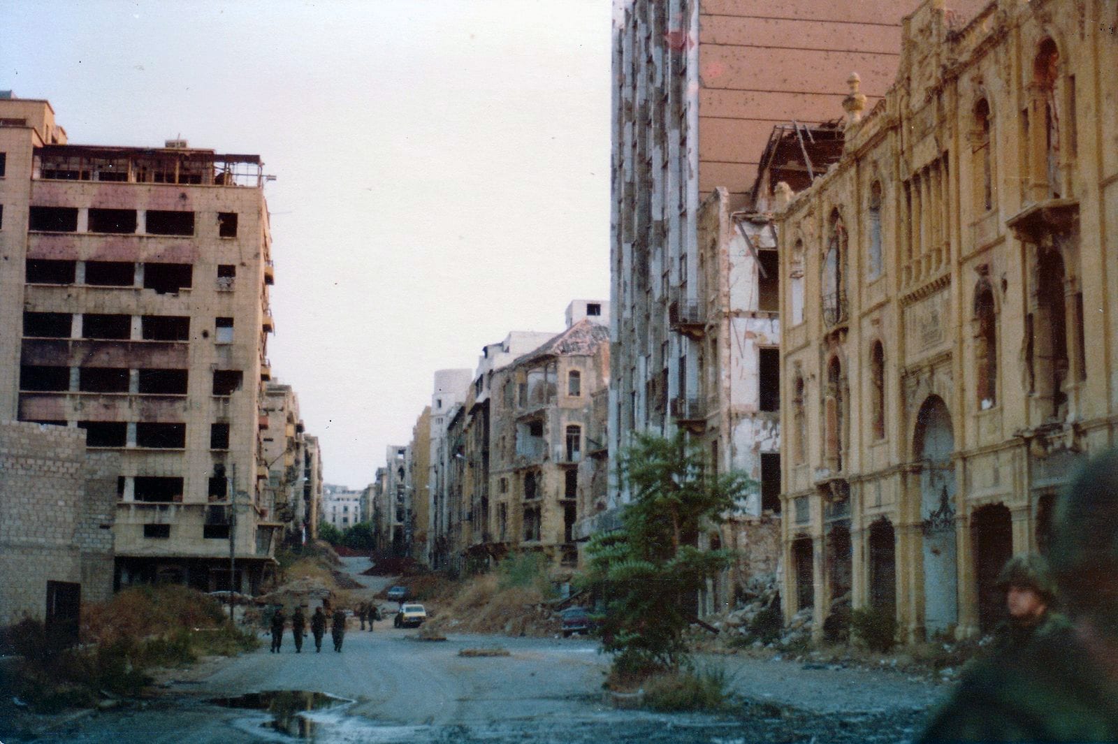 A deserted, rubble-strewn Beirut street of shell-pocked buildings along the wartime Green Line