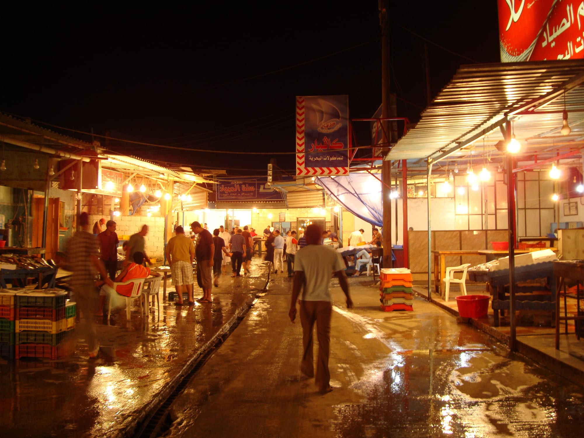 A fish market stall with fresh seafood on display