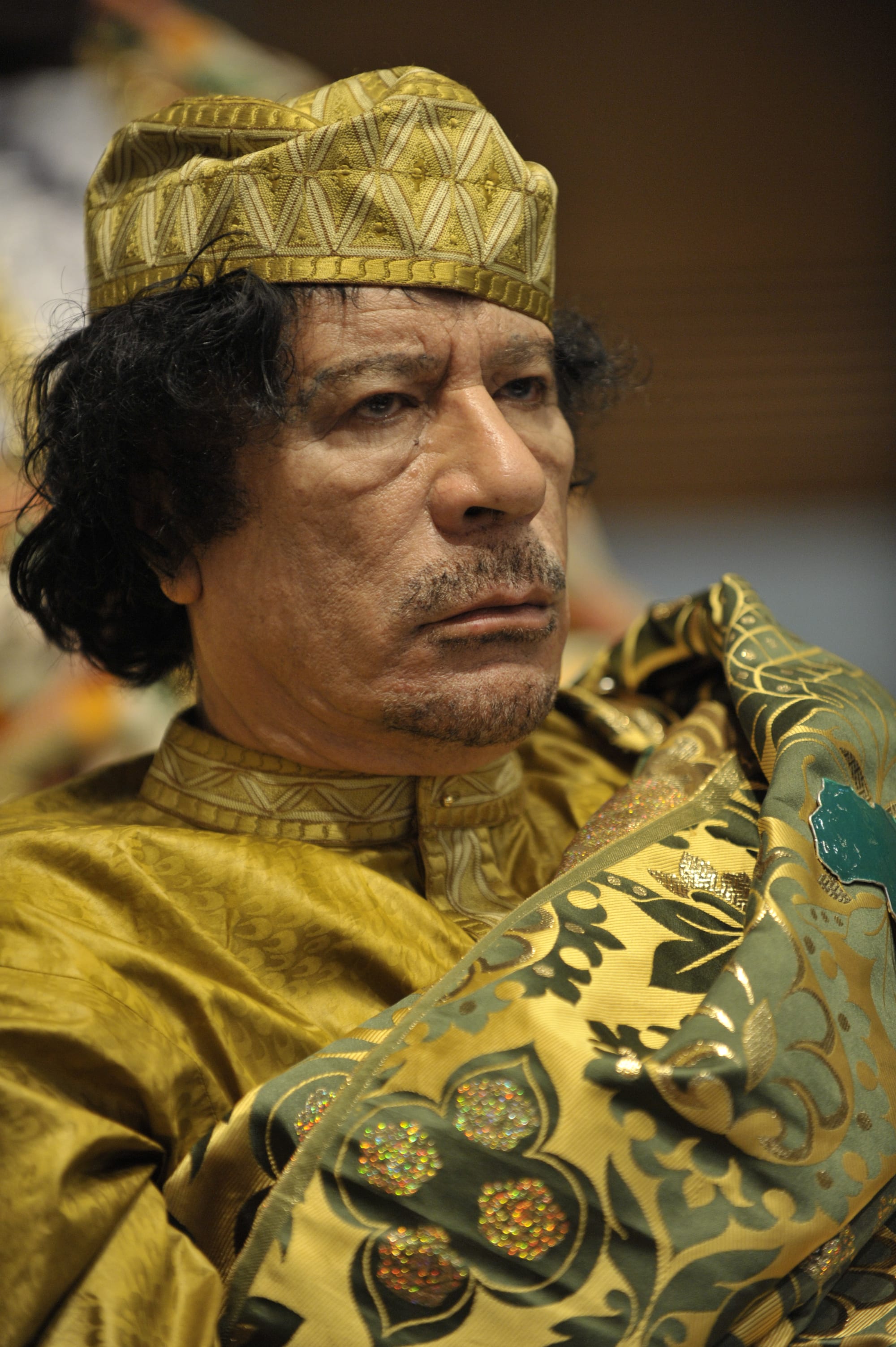 Muammar Gaddafi in flowing robes at an African Union summit