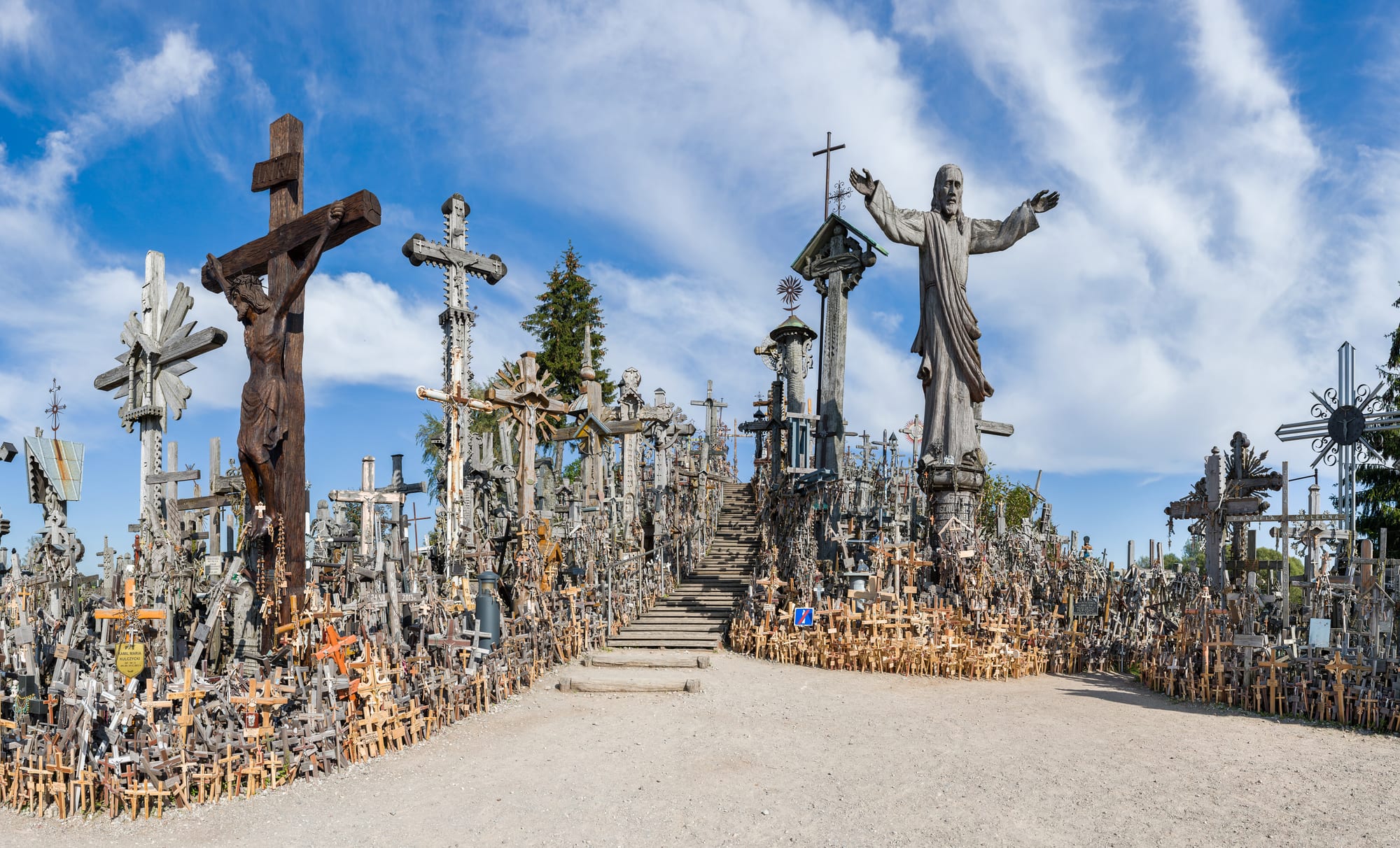 A hillside completely covered in tens of thousands of crosses of every size