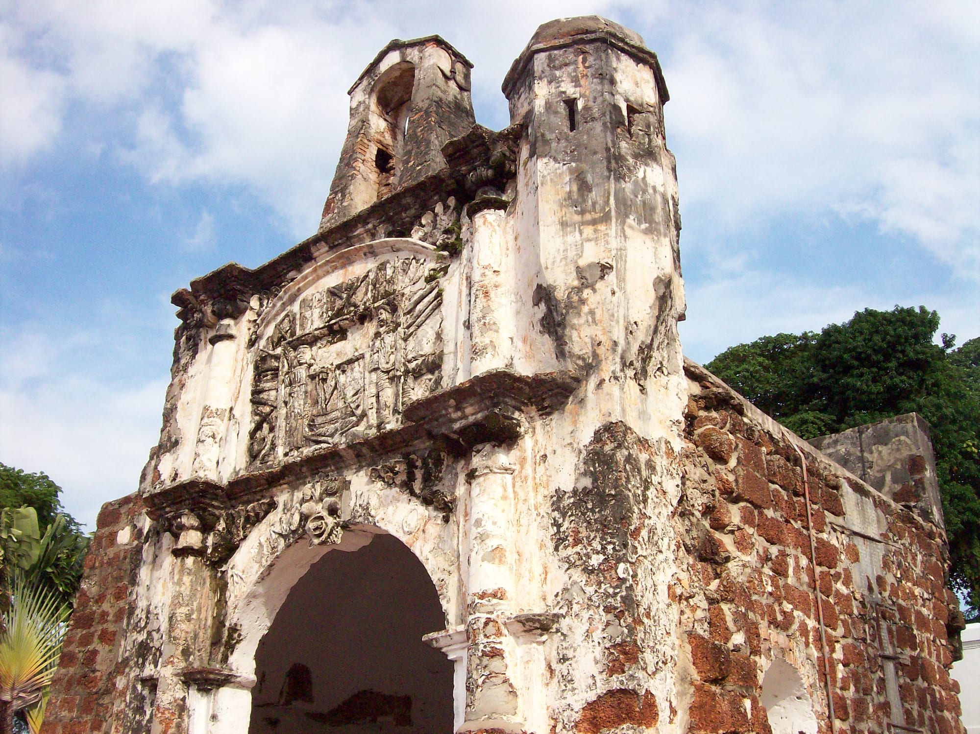 A weathered stone gateway, all that remains of the Portuguese A Famosa fortress in Malacca