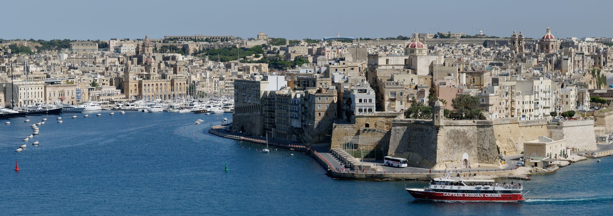 A deep natural harbour lined with fortified bastions and old warship anchorages