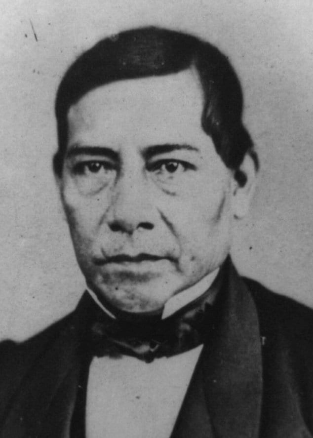 A formal 19th-century portrait of Benito Juárez in a dark suit and white bow tie