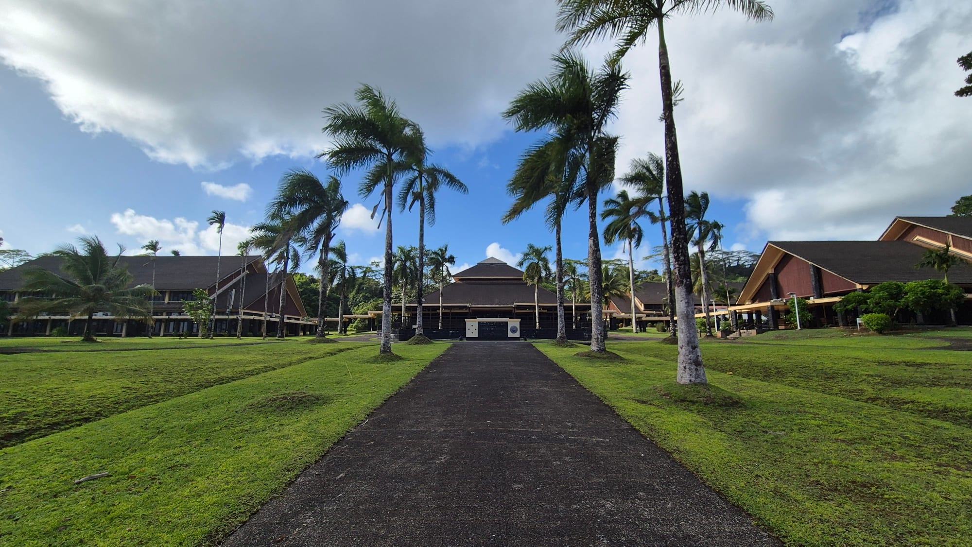 Government buildings set among palm trees on a small island