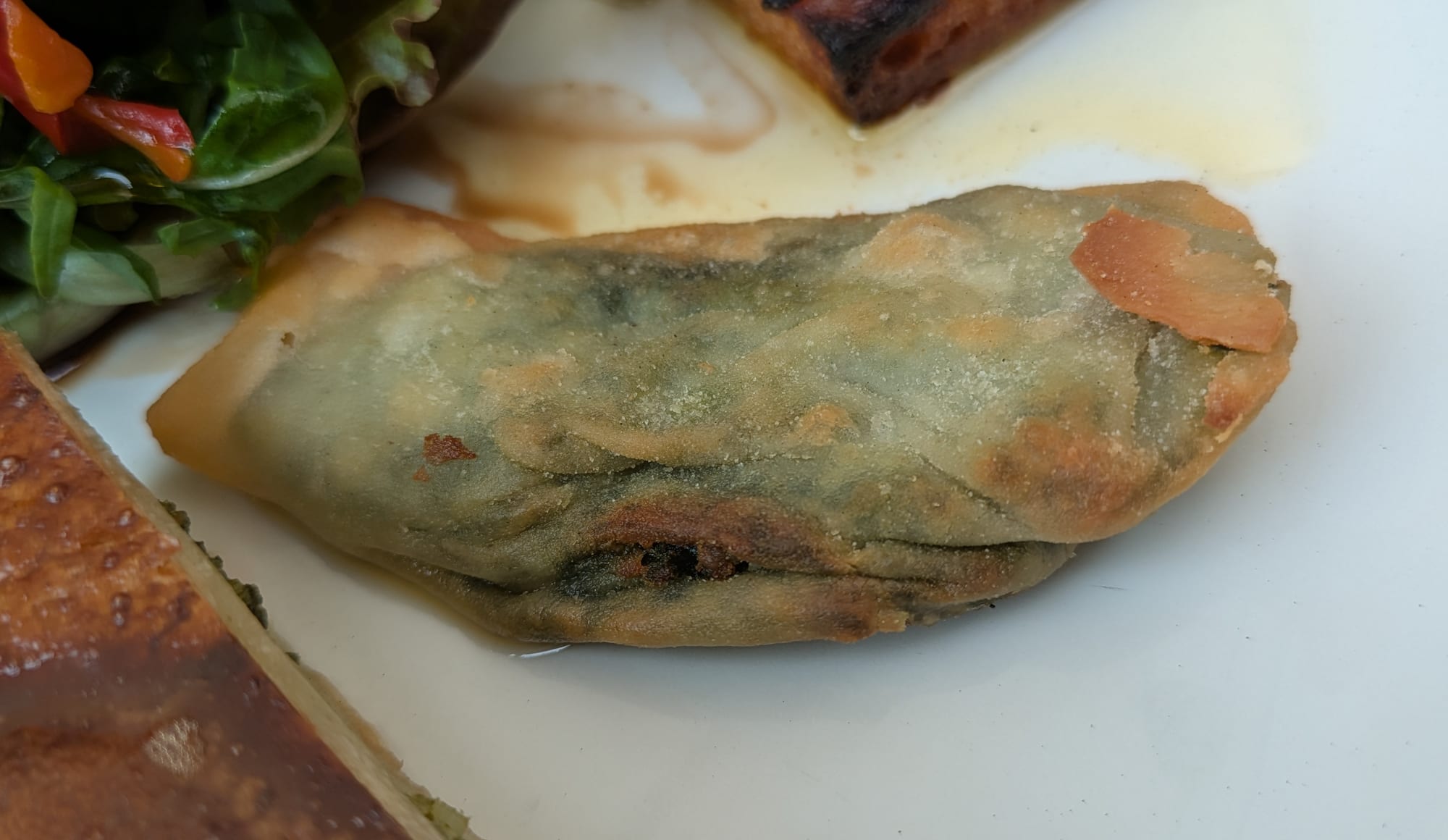 Small golden fried pastries on a plate