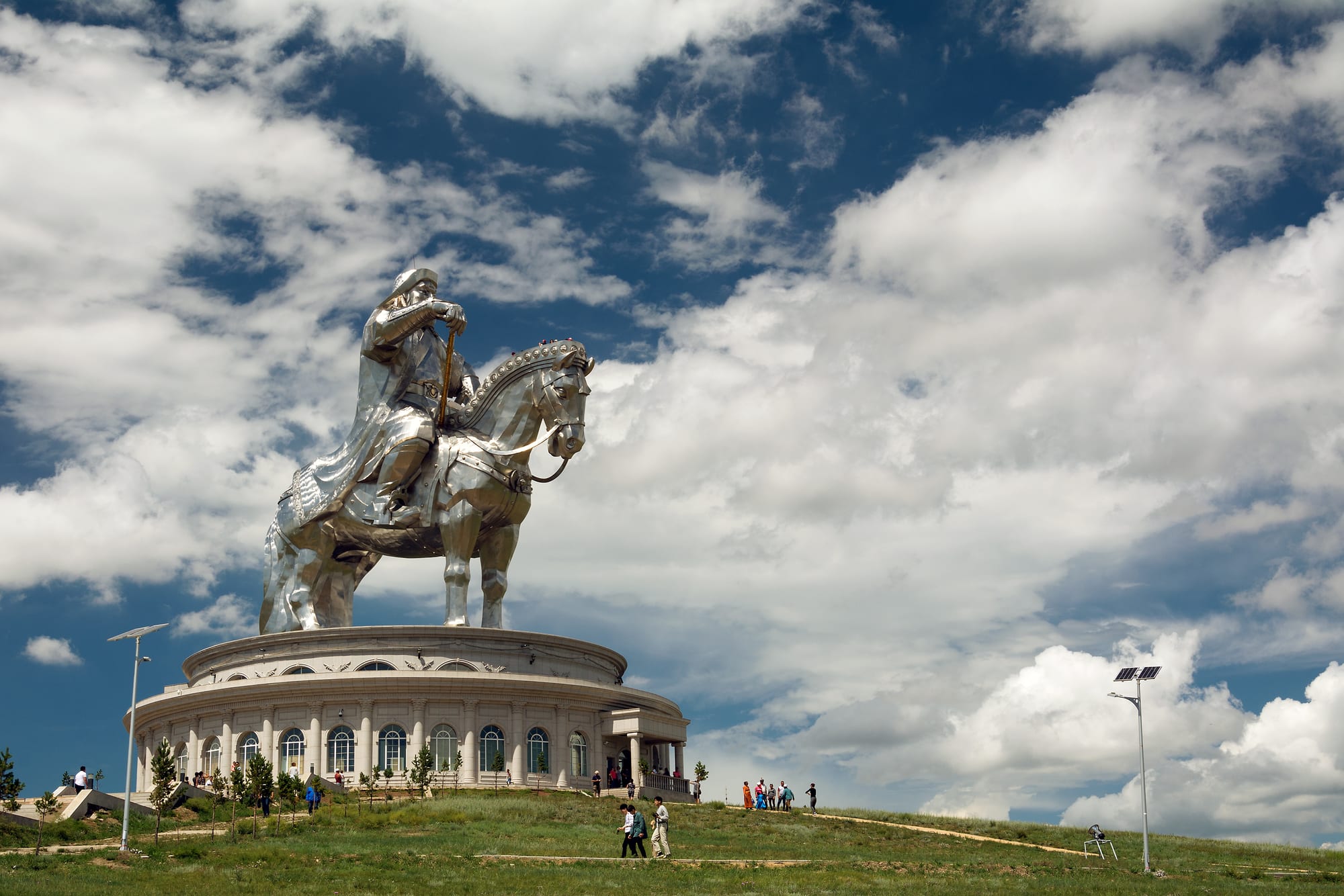 A colossal stainless-steel statue of Genghis Khan on horseback on the open steppe