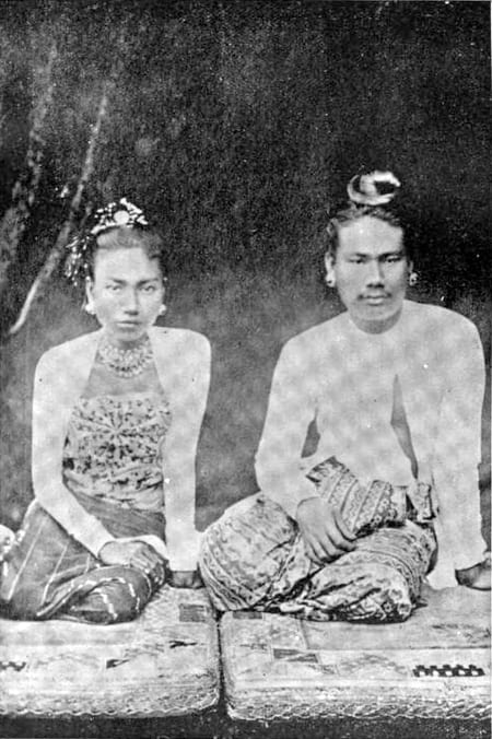 A photograph of King Thibaw and Queen Supayalat of Burma in royal dress
