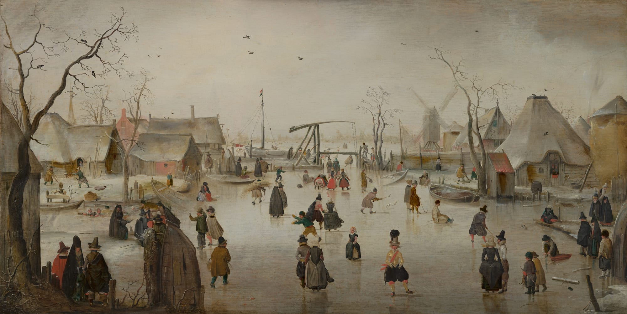 A 17th-century Dutch painting of a crowd skating and walking on a frozen waterway between thatched houses, a drawbridge, moored boats and a windmill