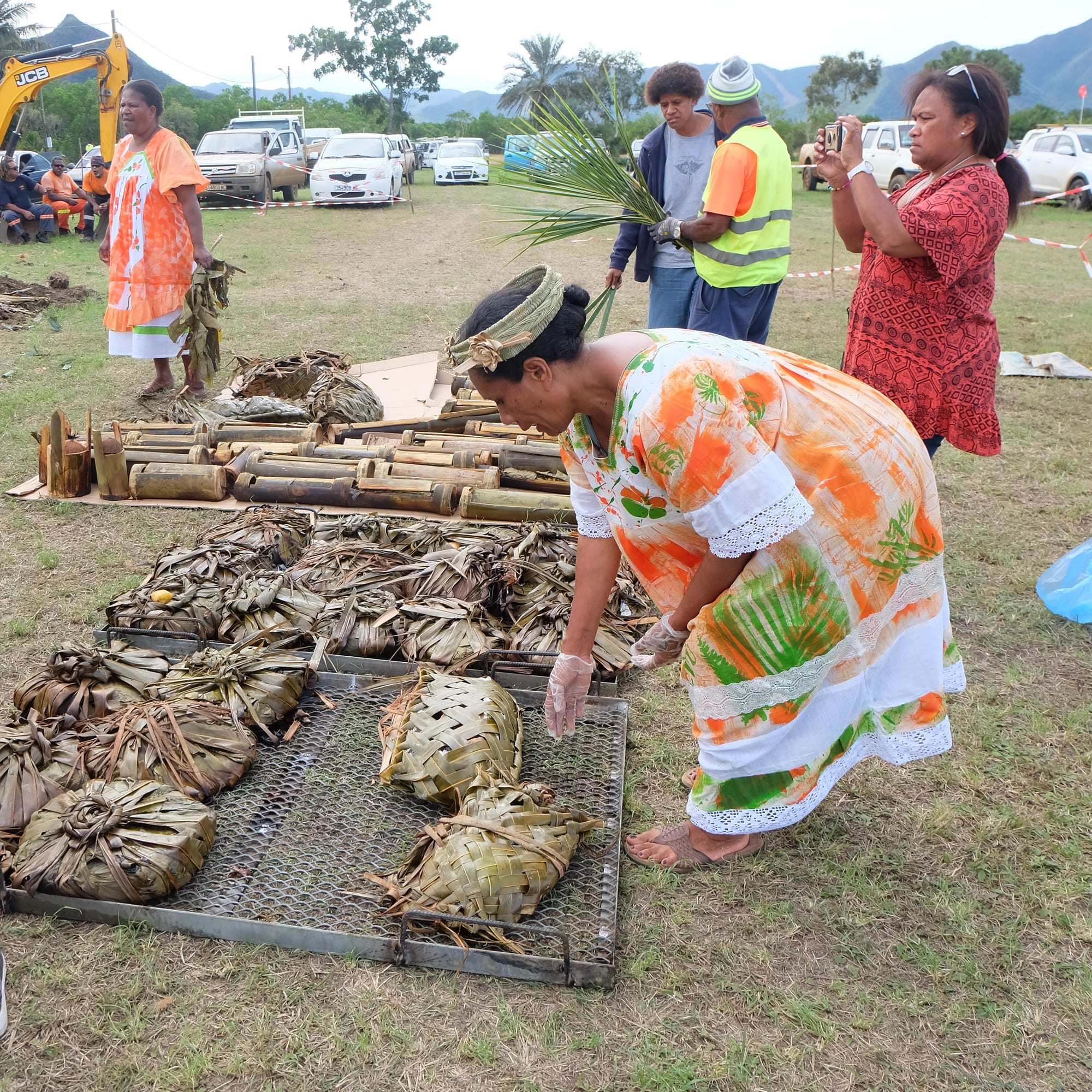 Root vegetables, meat and fruit wrapped and cooked in banana leaves
