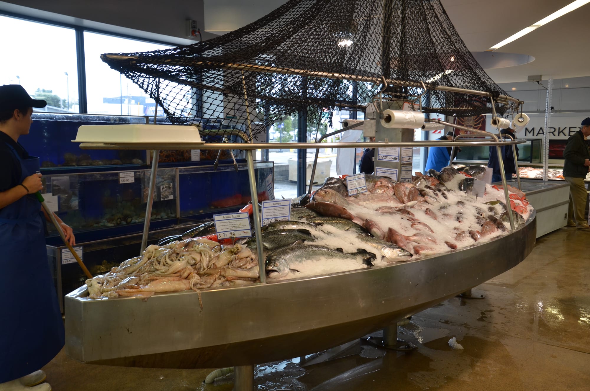 Fresh seafood displayed in a market case