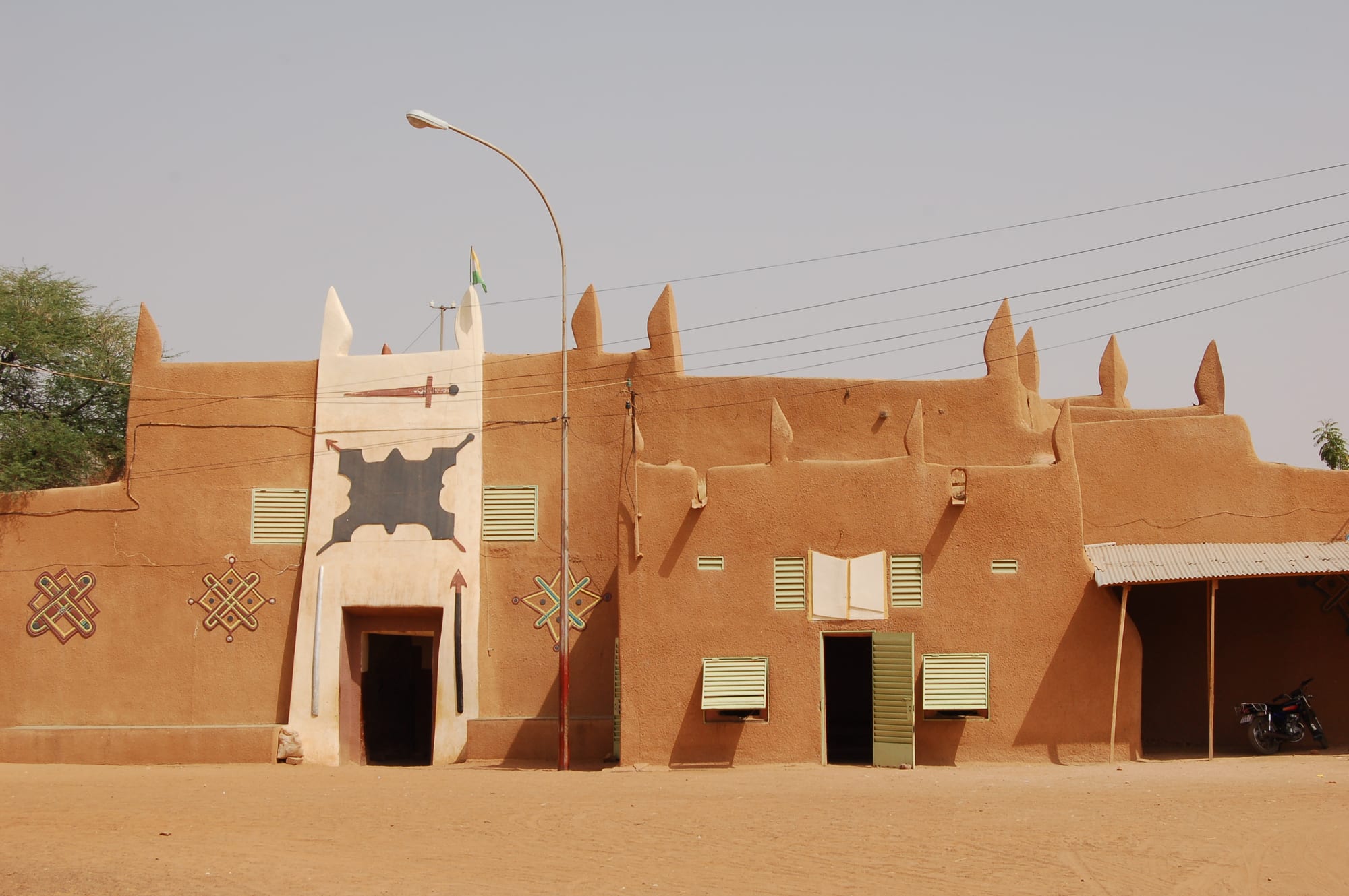 The earthen walls and conical towers of the Sultan's palace at Zinder