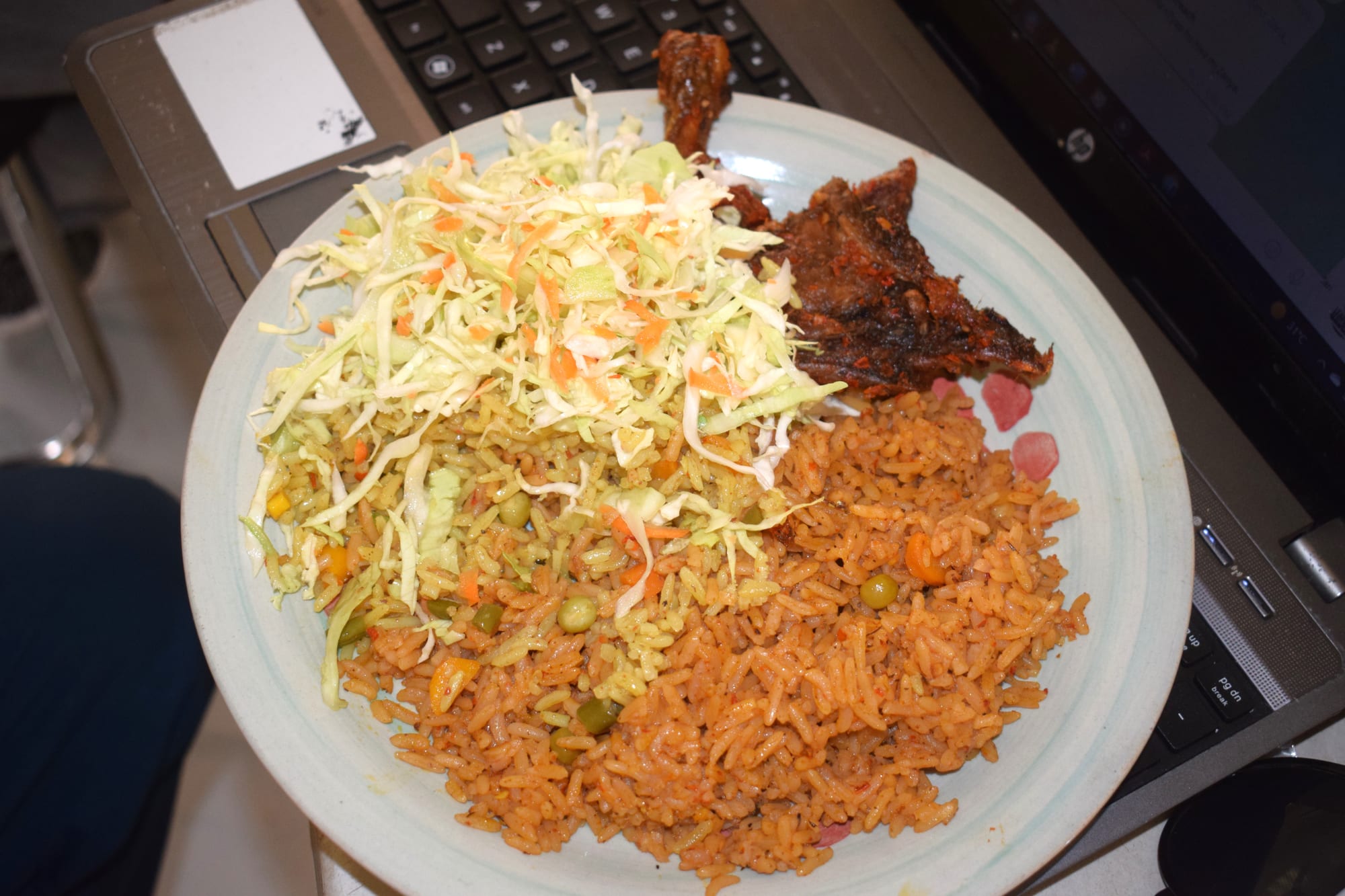 A plate of orange-red tomato-based rice