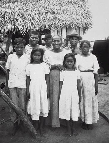 A studio photograph of a Chamorro family in the Mariana Islands in 1915