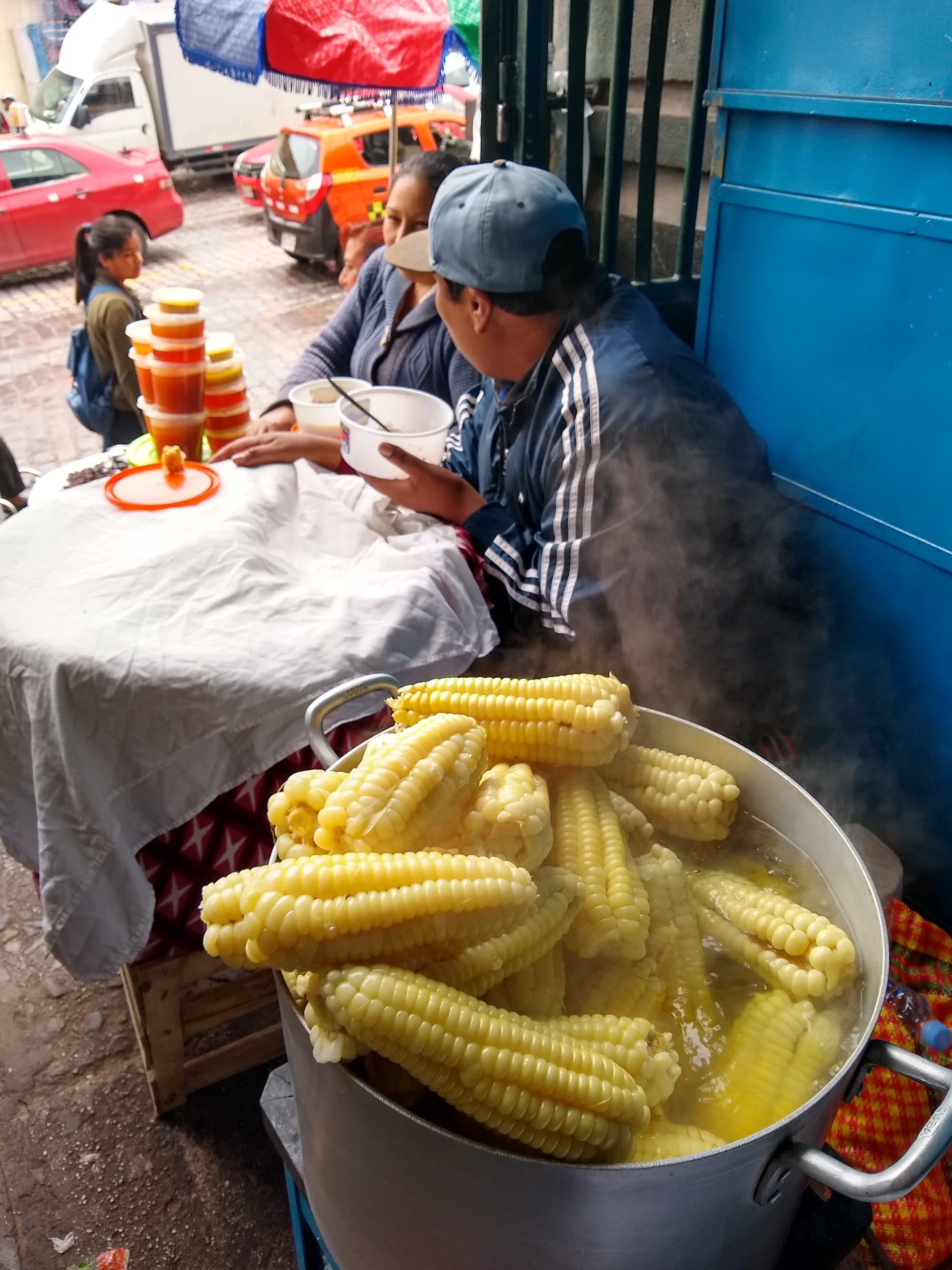 Ears of large-kernelled corn for sale at a market stall