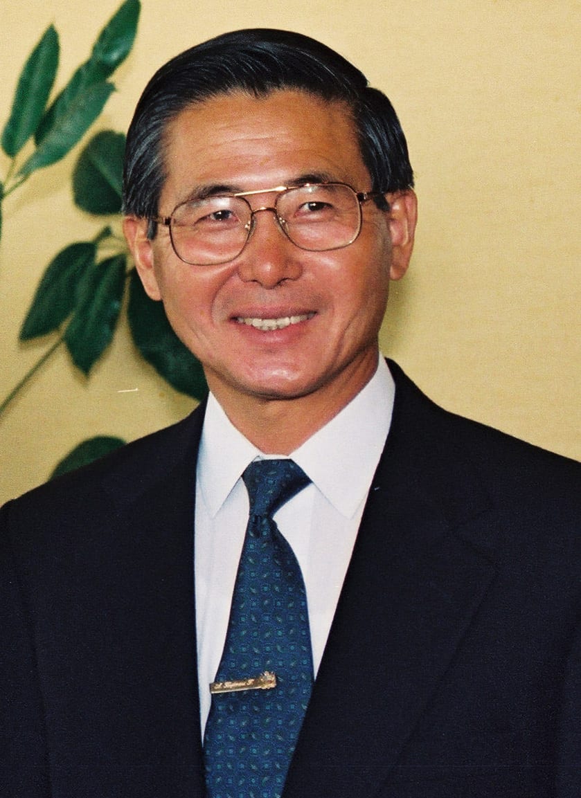 A formal portrait of Alberto Fujimori in a suit, 1991