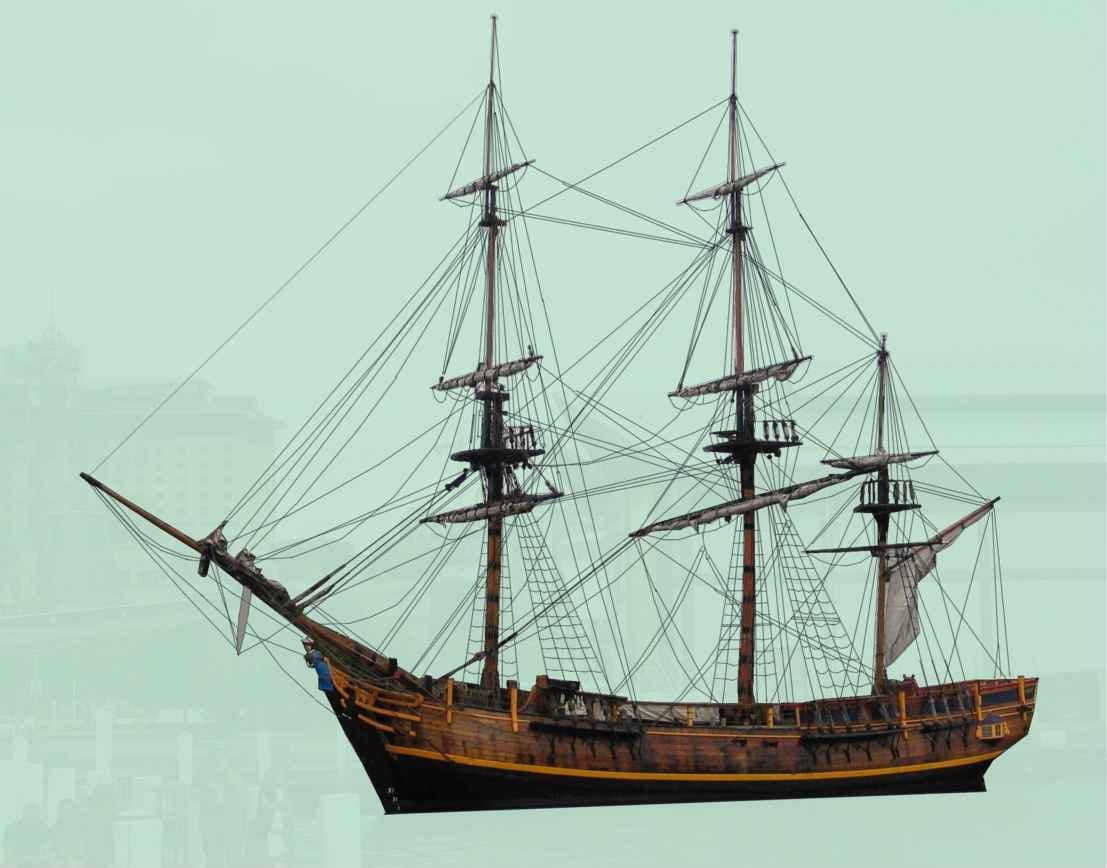 A tall-masted sailing ship replica on the water