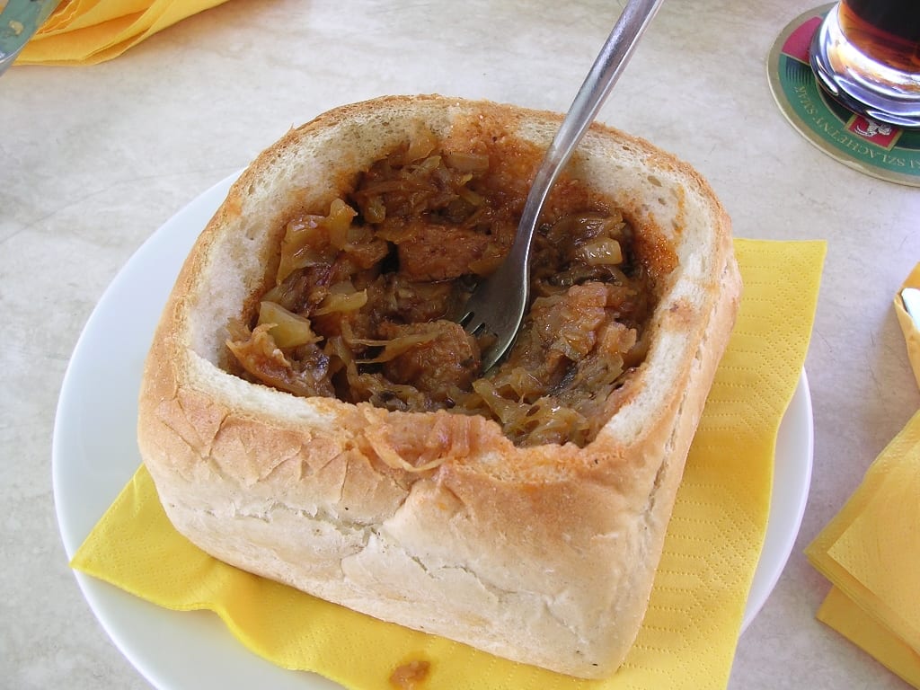 A bowl of stewed meat and cabbage