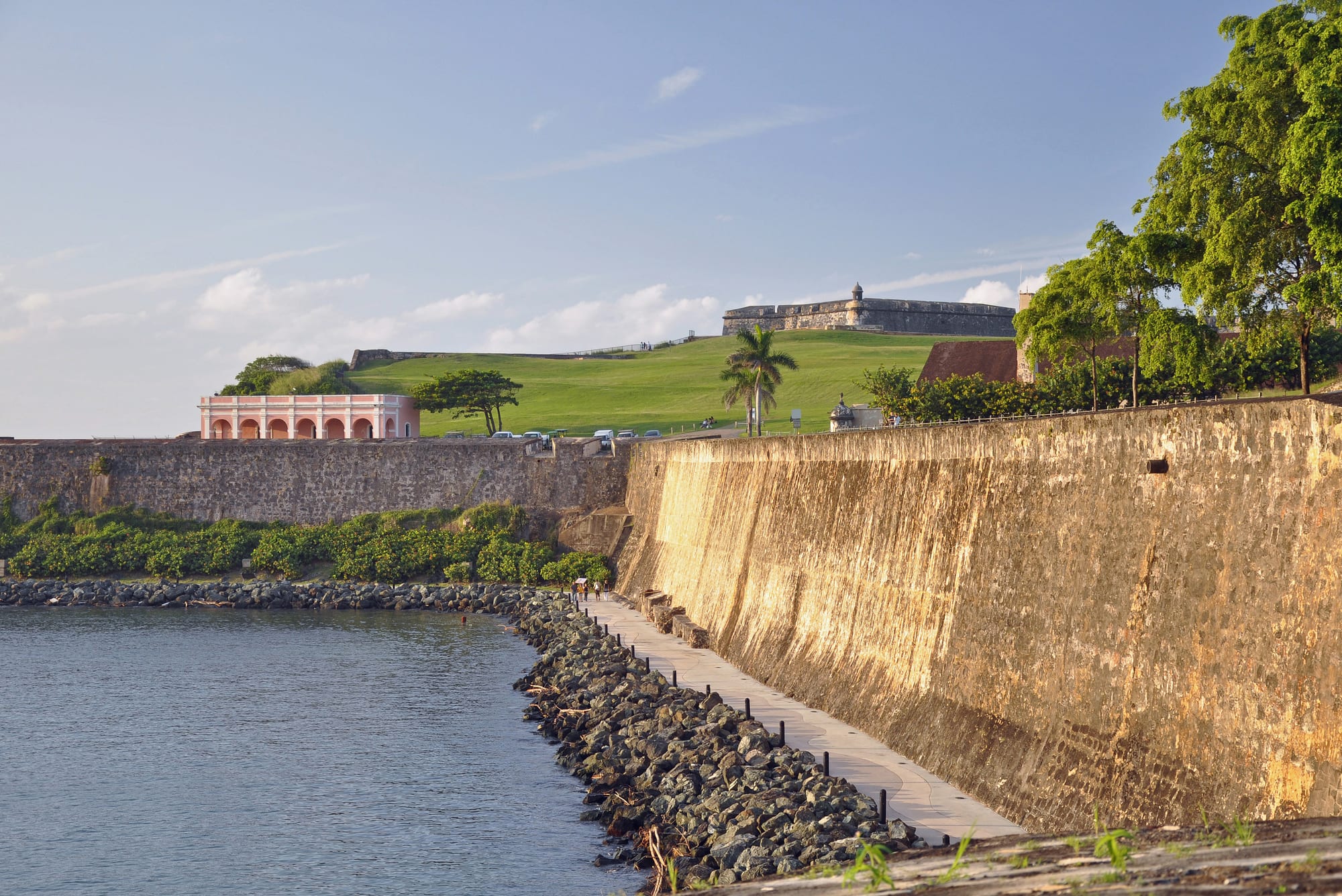 The massive stone walls and sentry boxes of the Spanish fortifications wrapping around Old San Juan by the sea