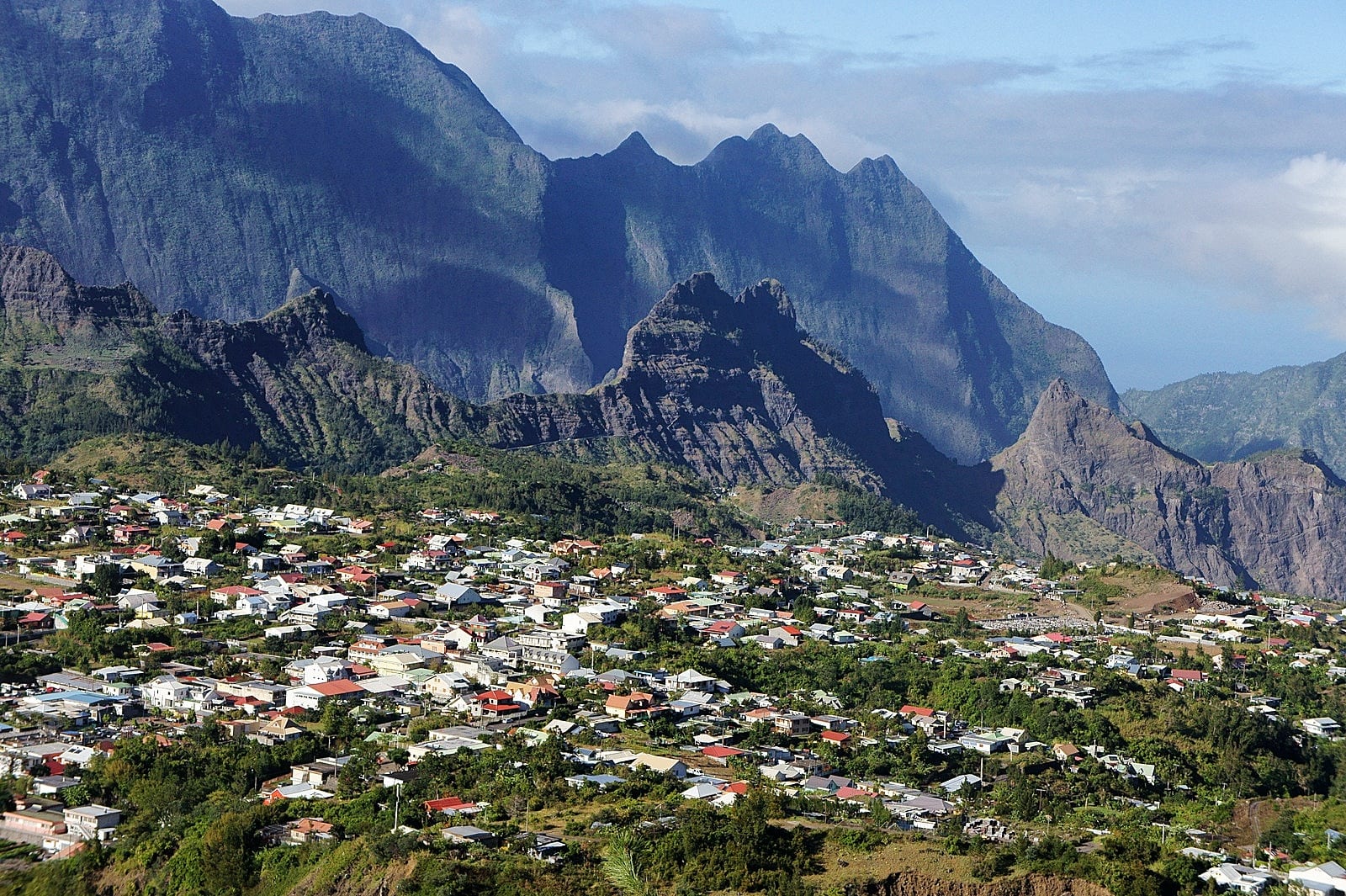 A steep-walled valley town surrounded by high cliffs