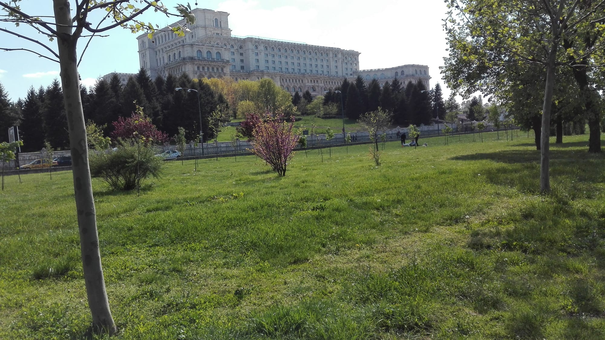 A vast government building seen across a park