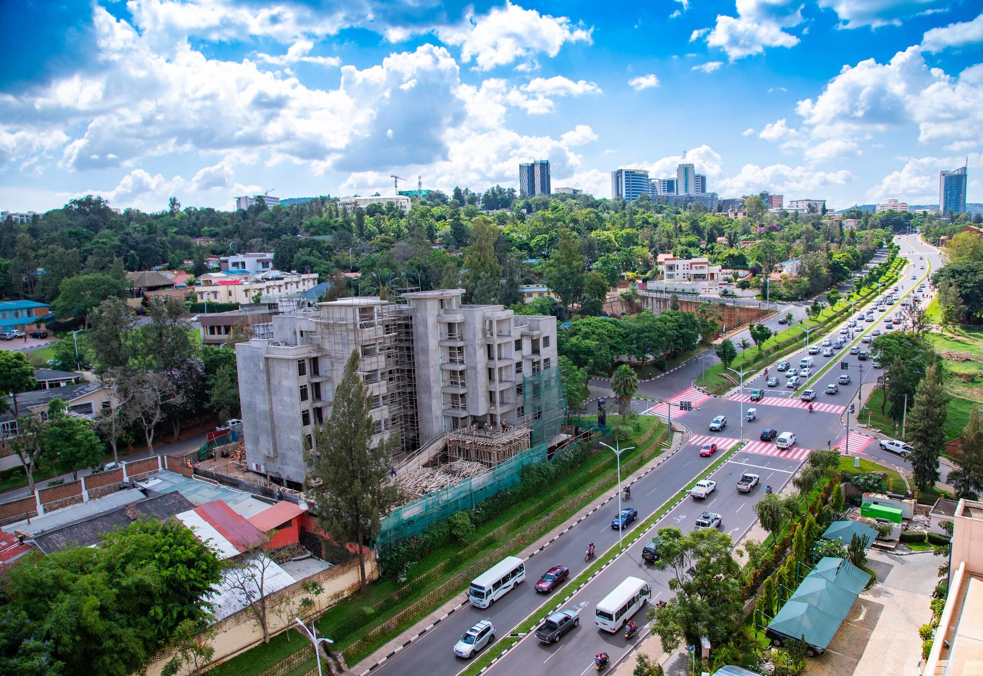 A clean, orderly city street with modern buildings